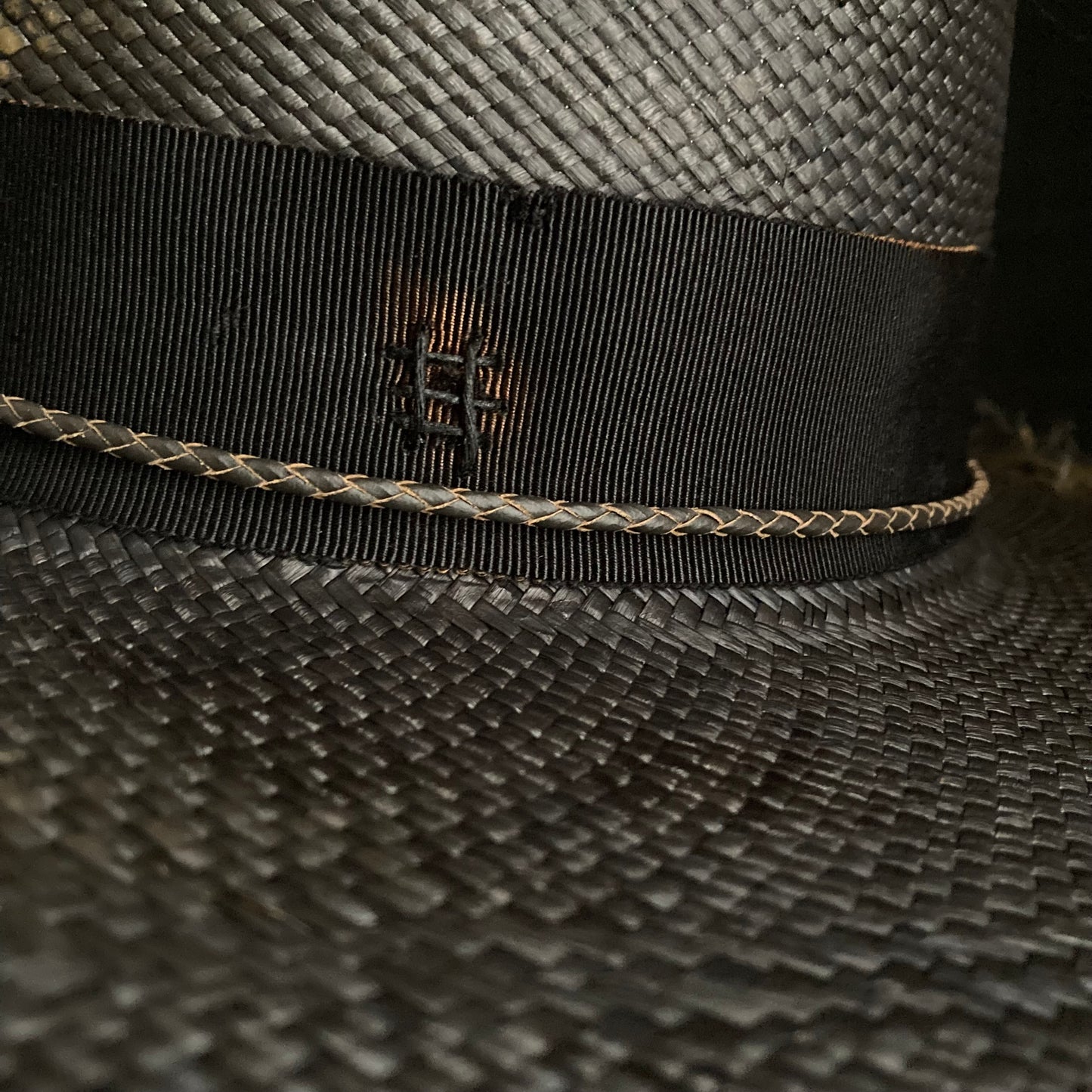 Burned scars black panama hat