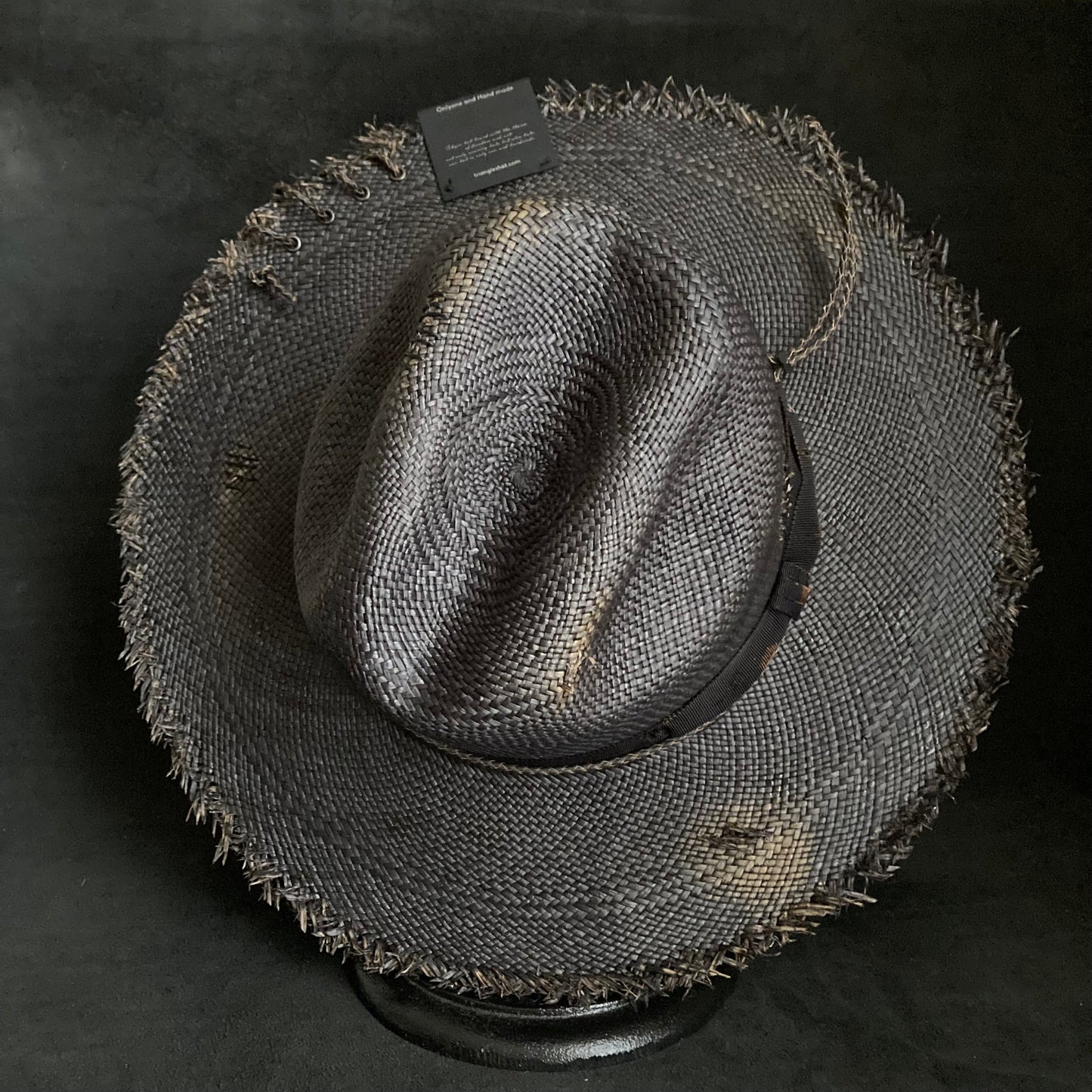 Burned scars black panama hat