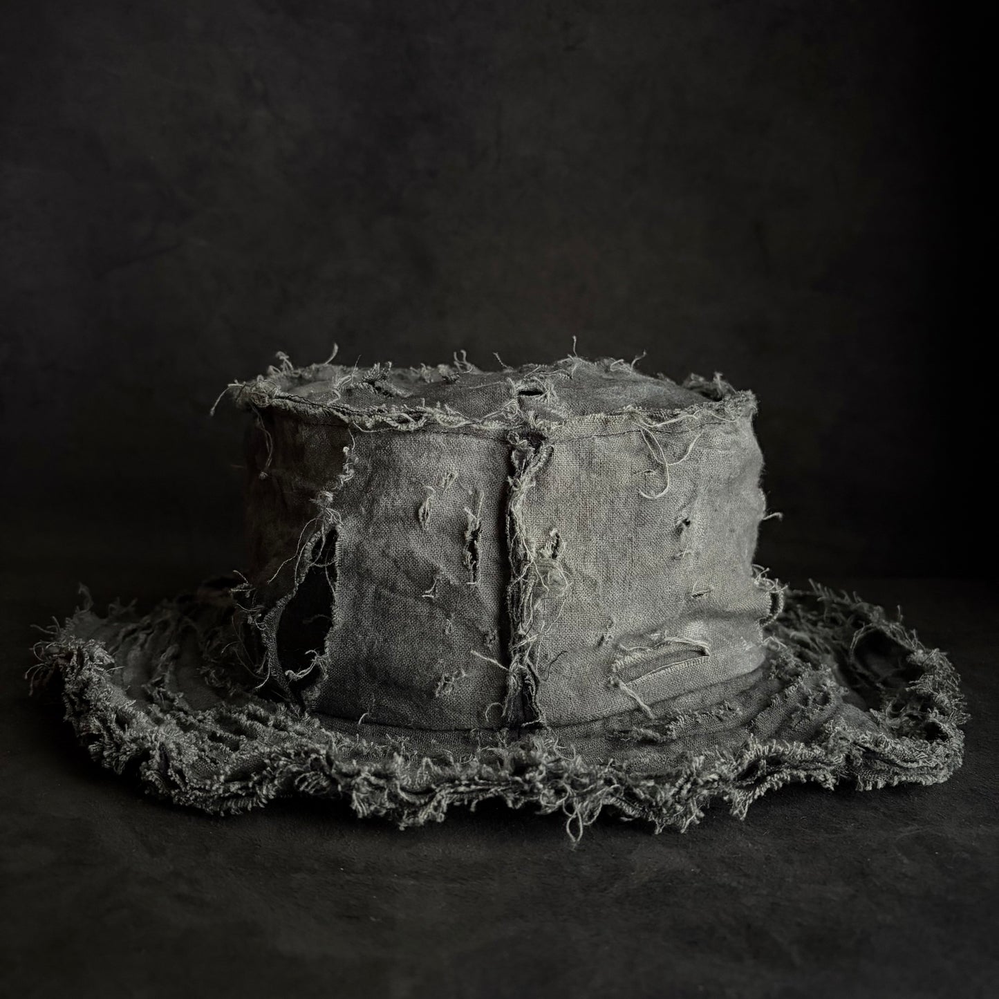 Mottled gray damage bucket hat