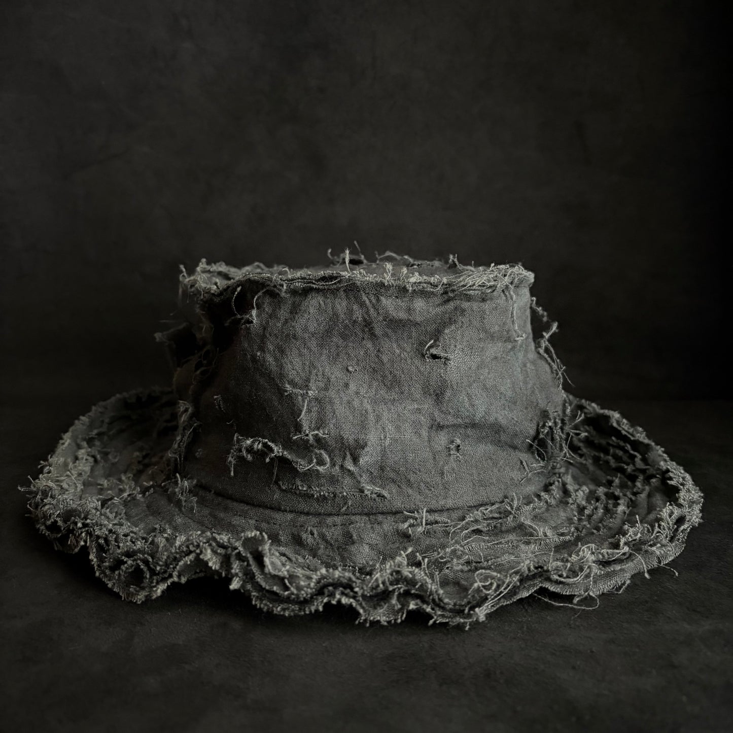Mottled gray damage bucket hat