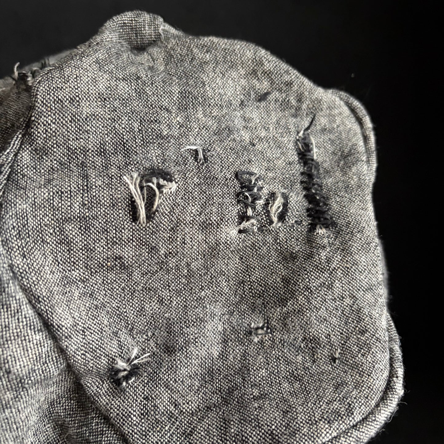 Slab black gray damage turn cap