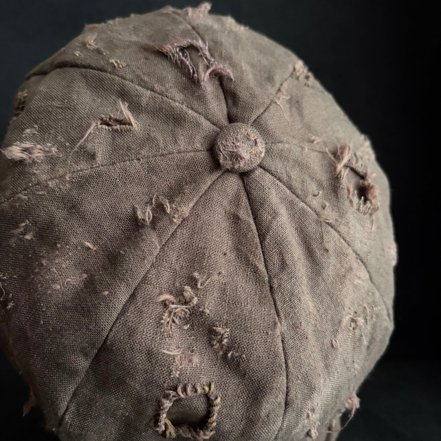 Brown linen damaged discolored casquette