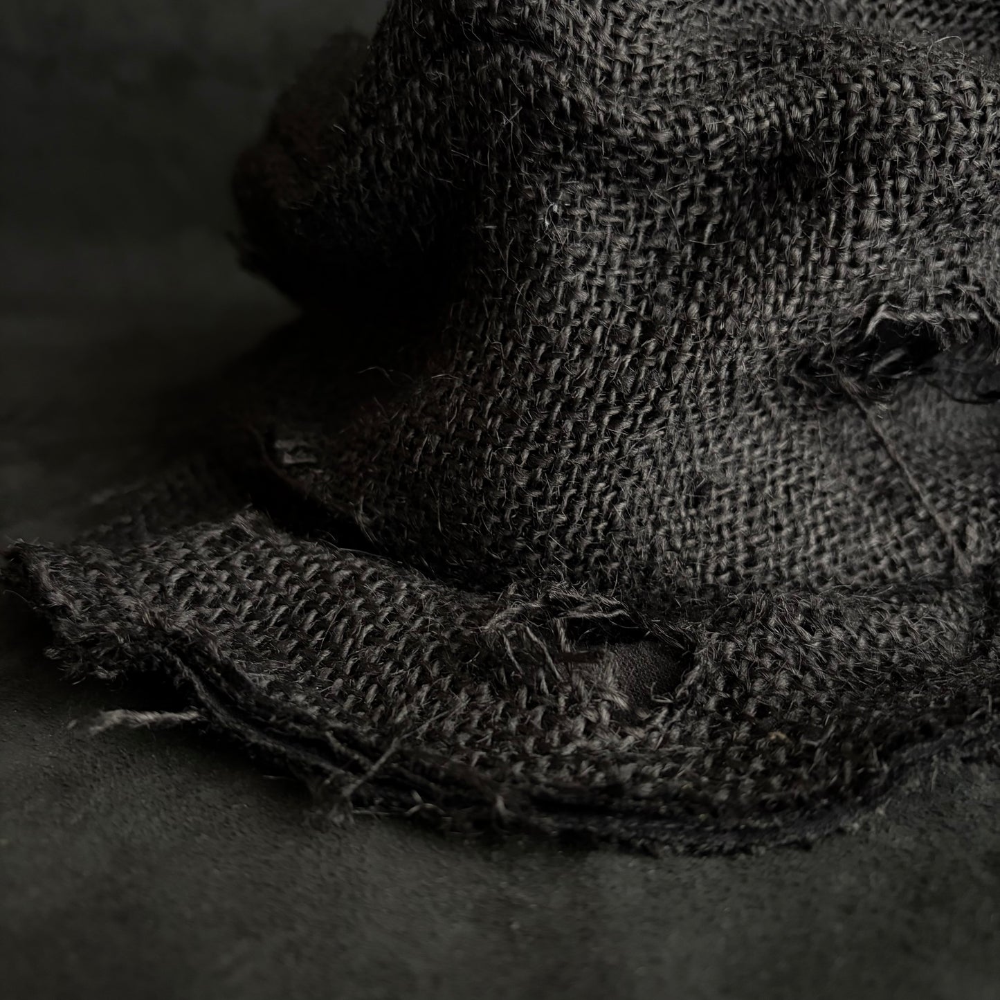 Black jute damage turn cap