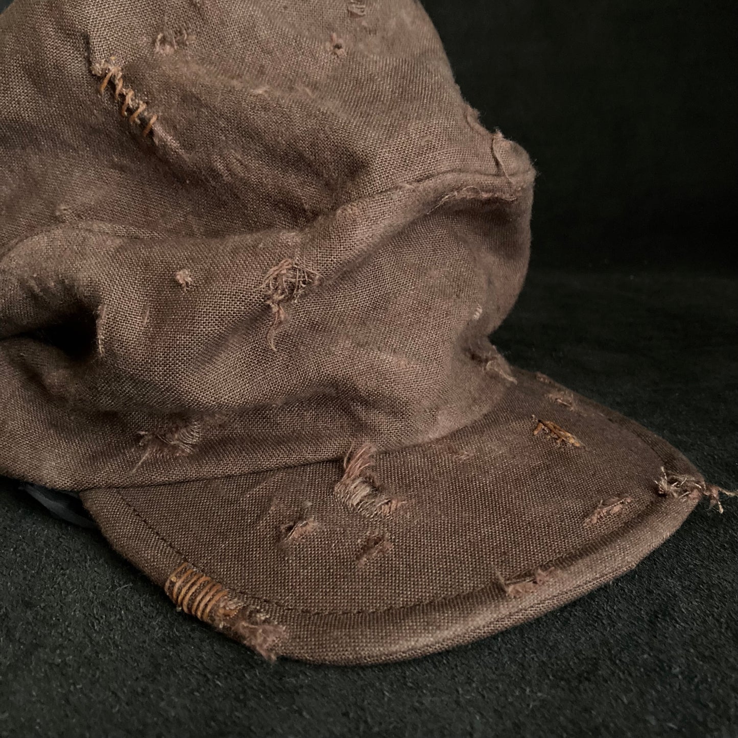 Brown linen damage turn cap (brim core)