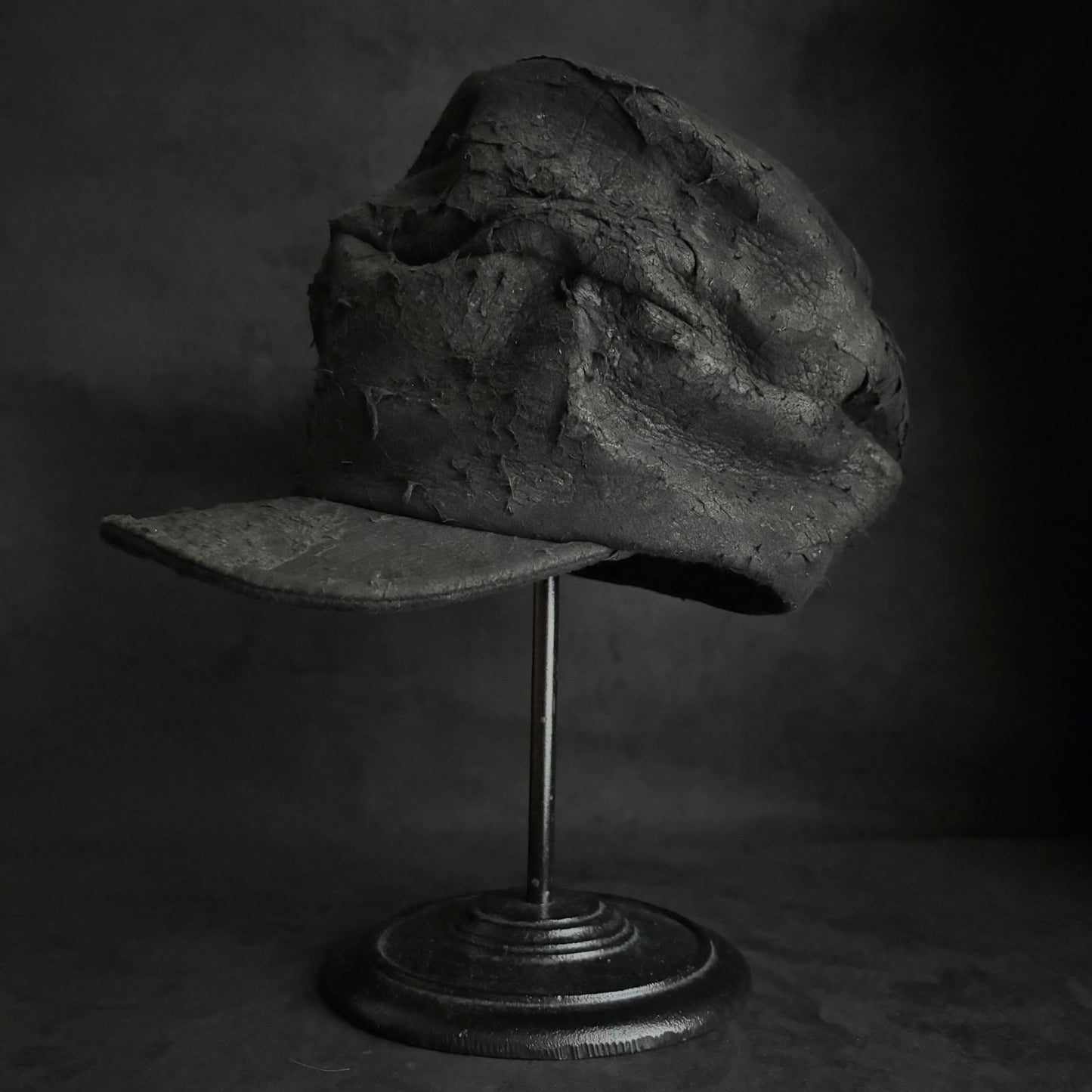 Floor under black leather turn cap (brim core)