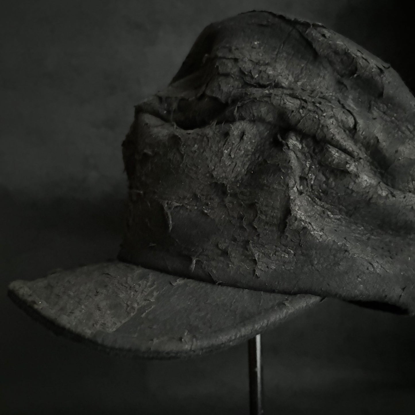 Floor under black leather turn cap (brim core)