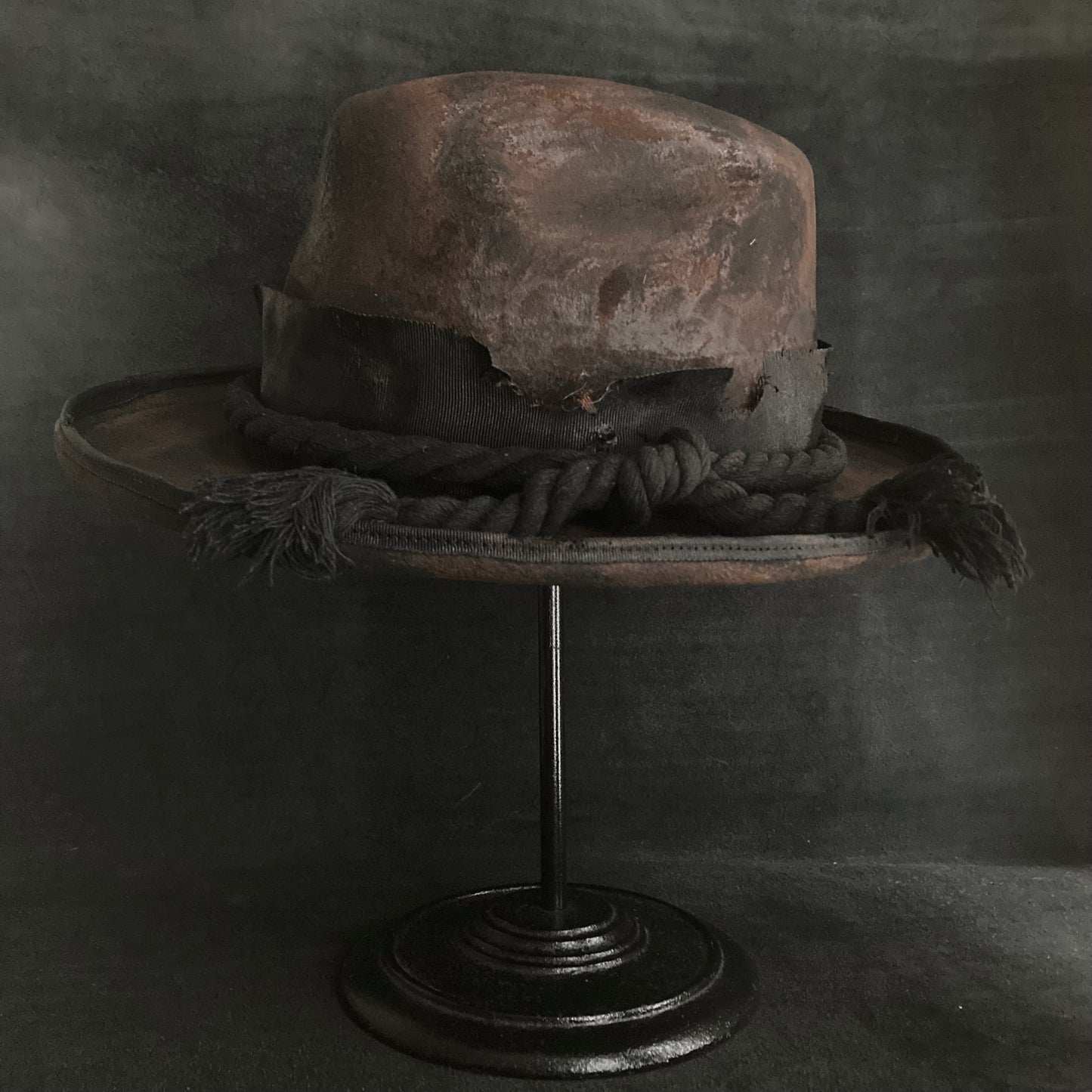 Hard burned dark western hat