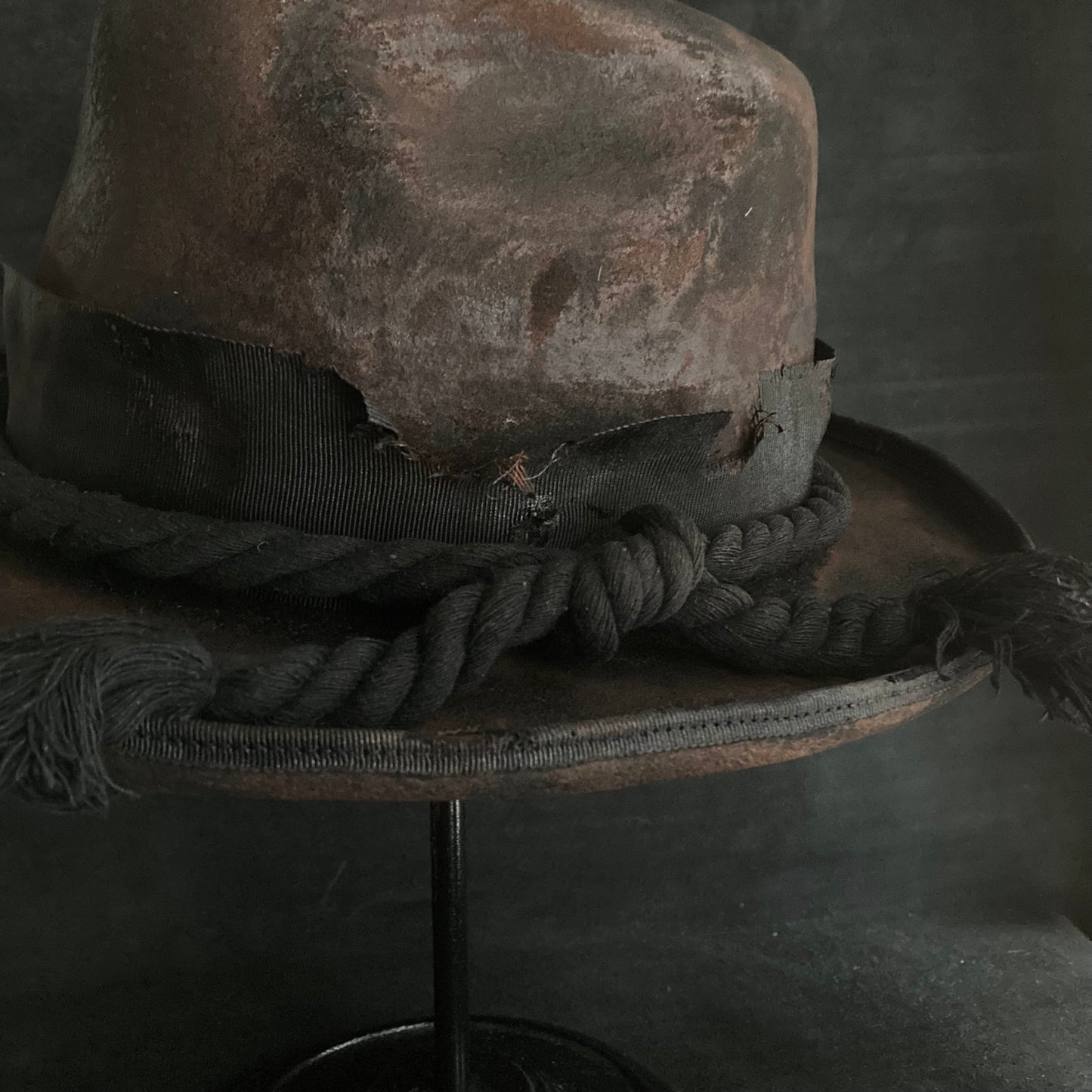 Hard burned dark western hat