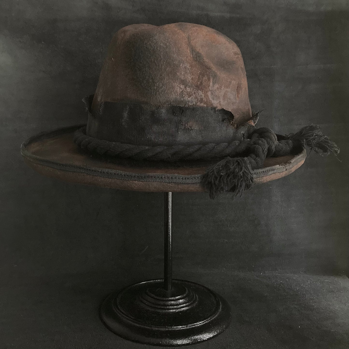 Hard burned dark western hat