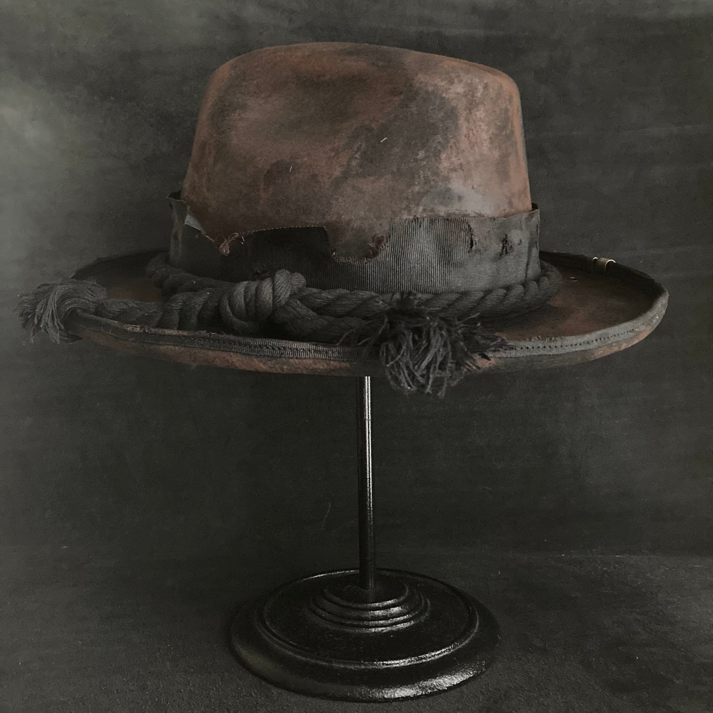 Hard burned dark western hat