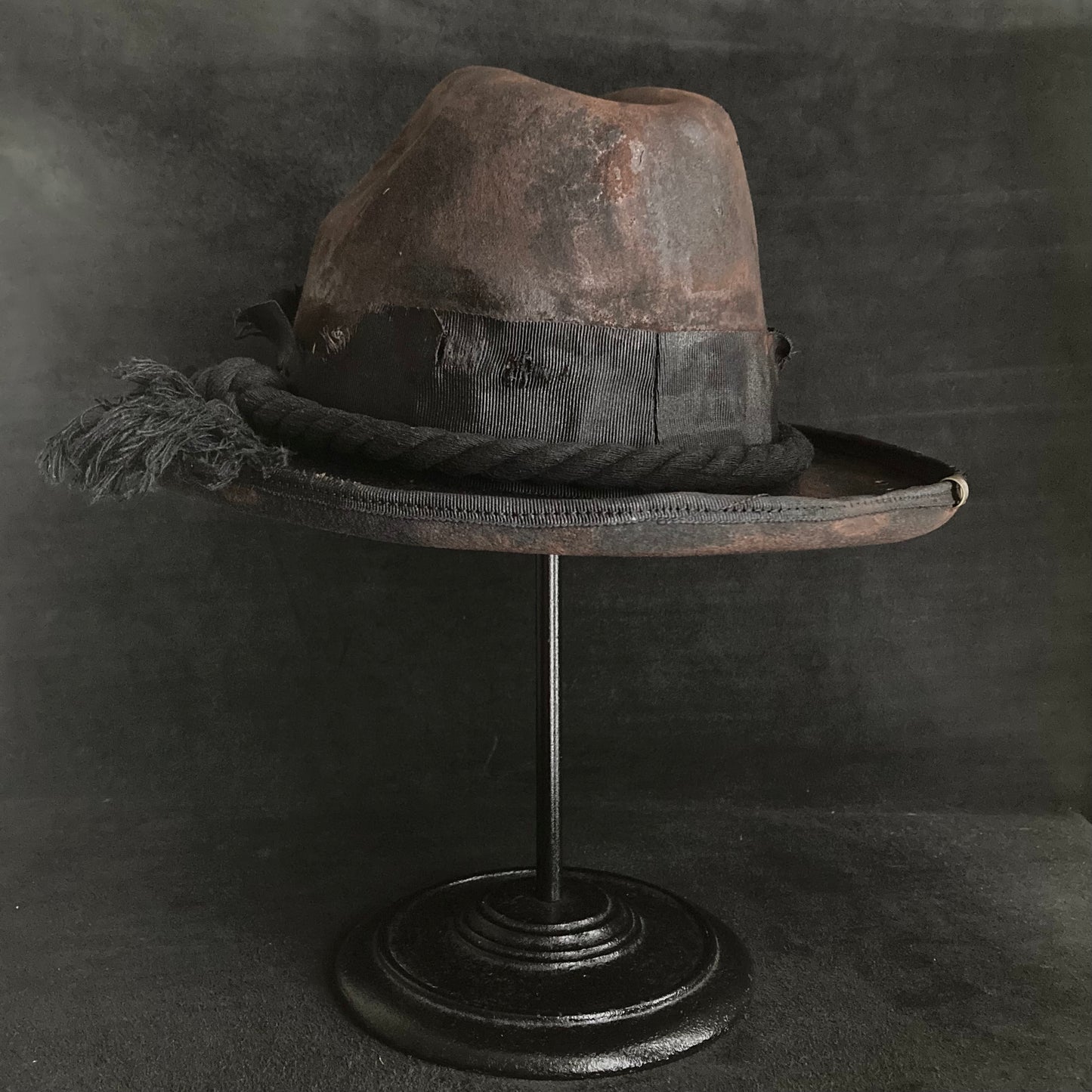 Hard burned dark western hat