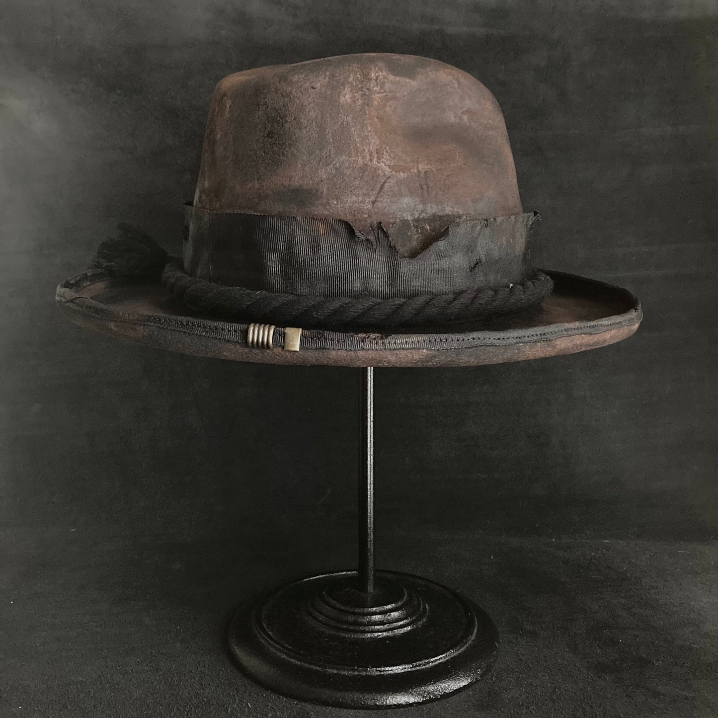 Hard burned dark western hat