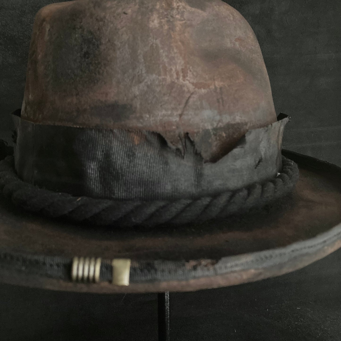 Hard burned dark western hat