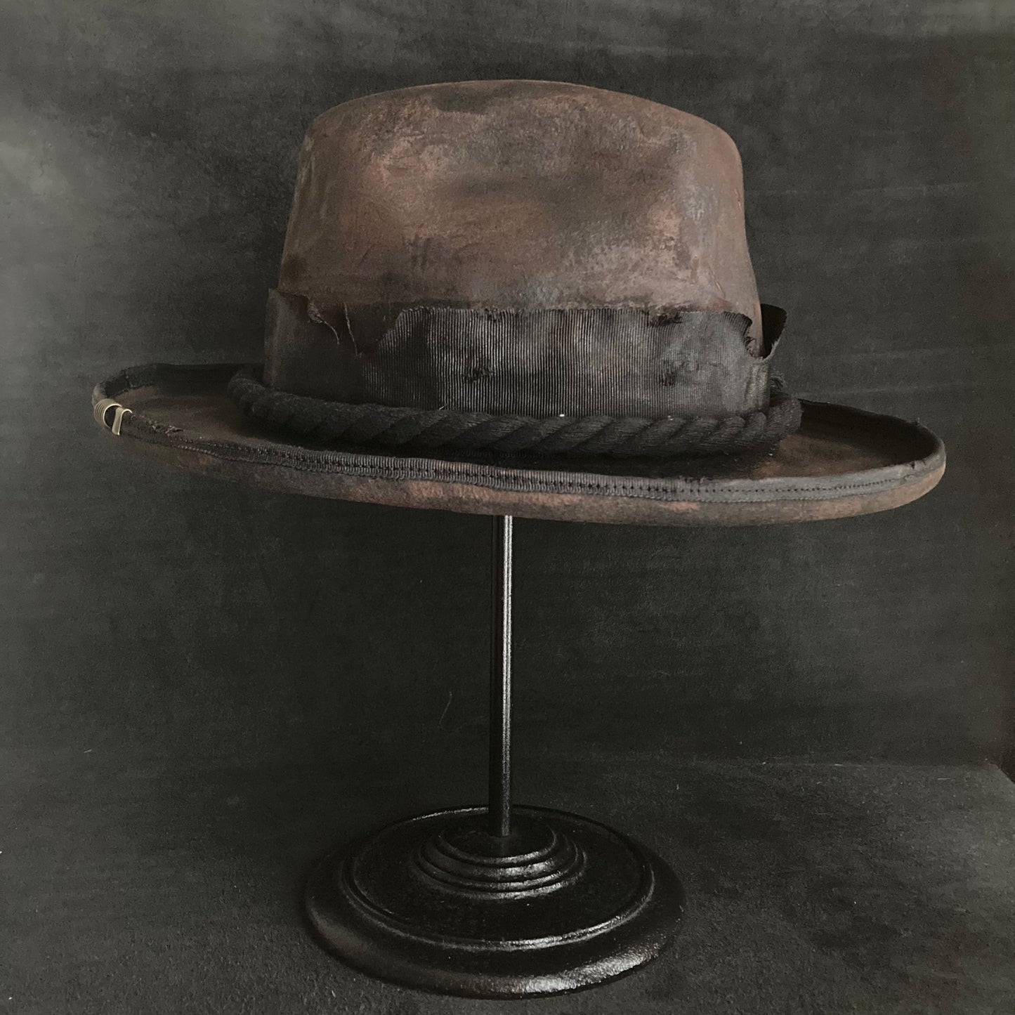 Hard burned dark western hat