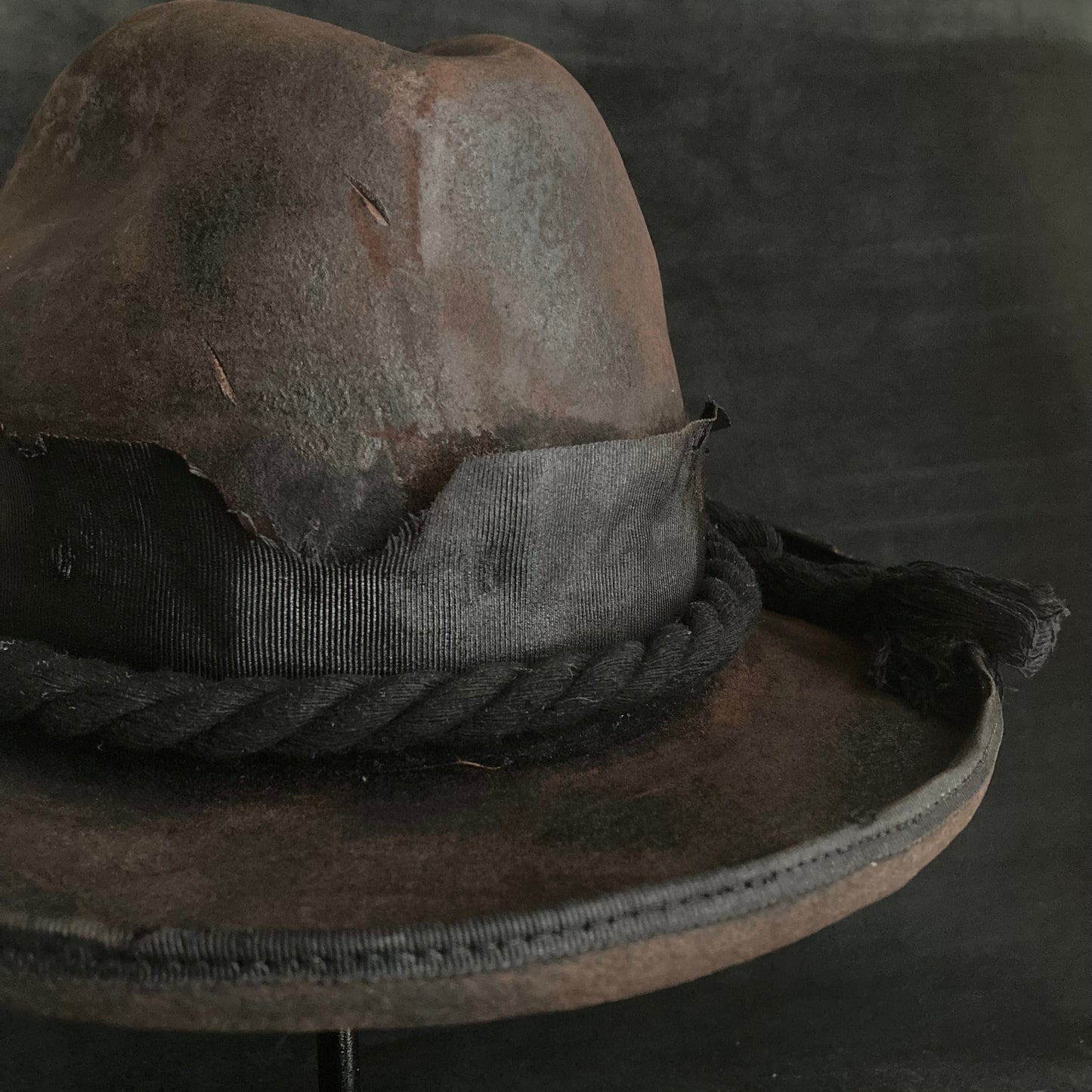 Hard burned dark western hat