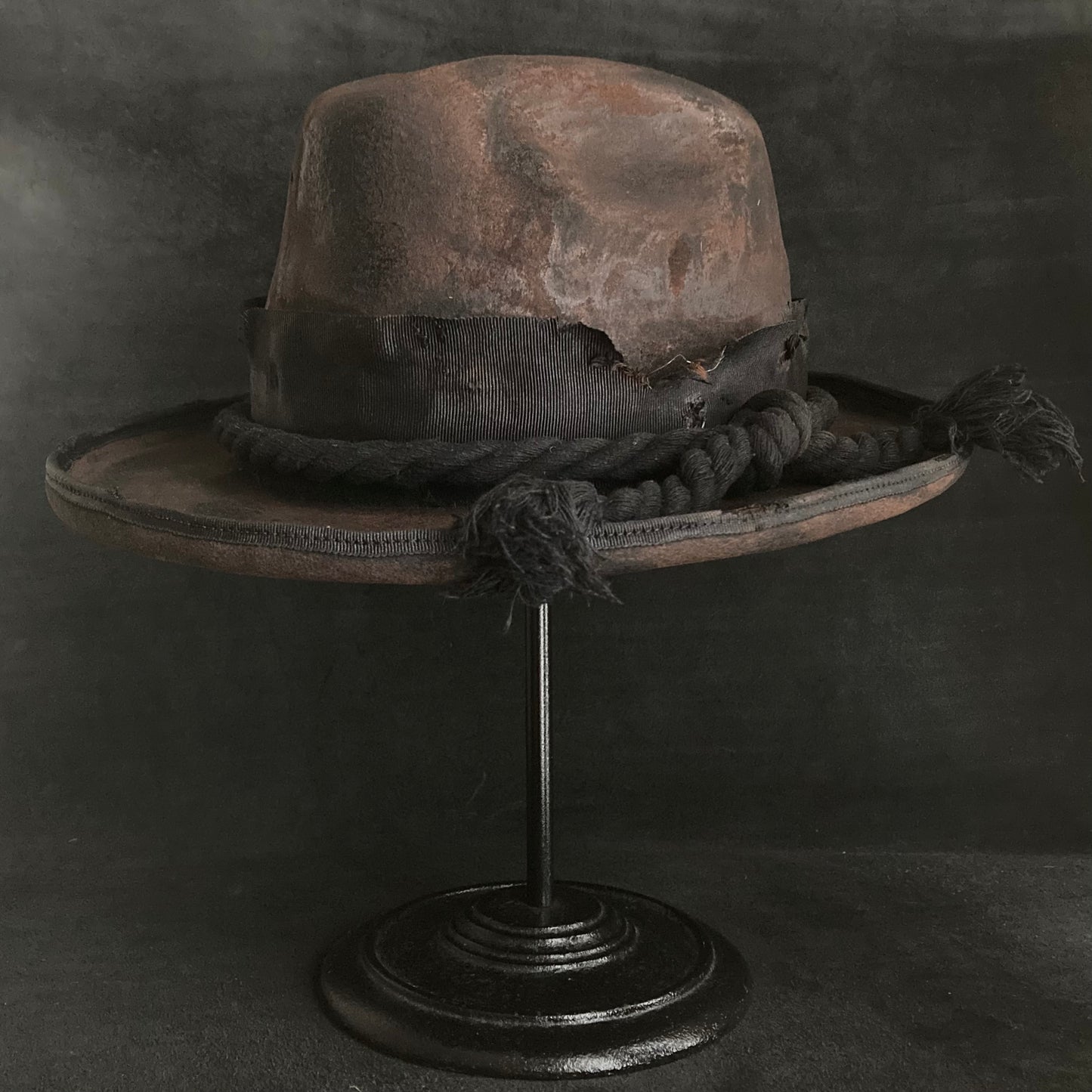 Hard burned dark western hat