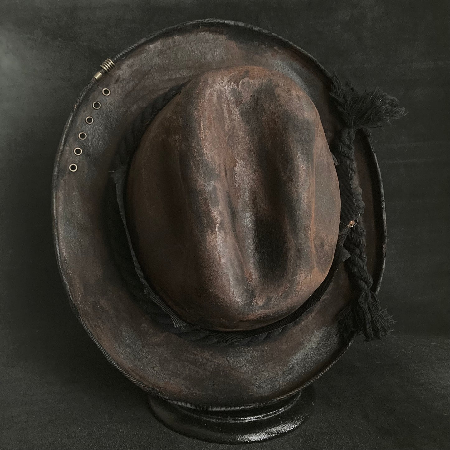 Hard burned dark western hat