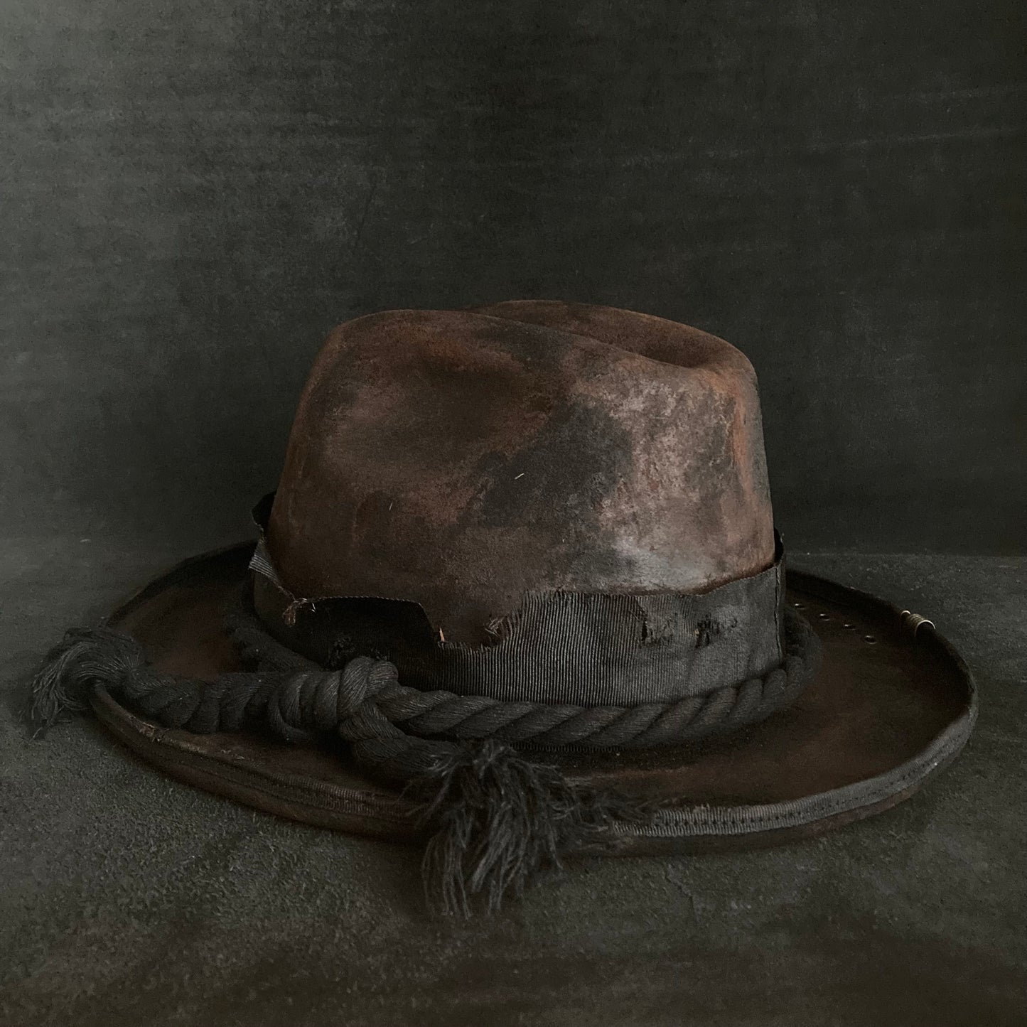Hard burned dark western hat