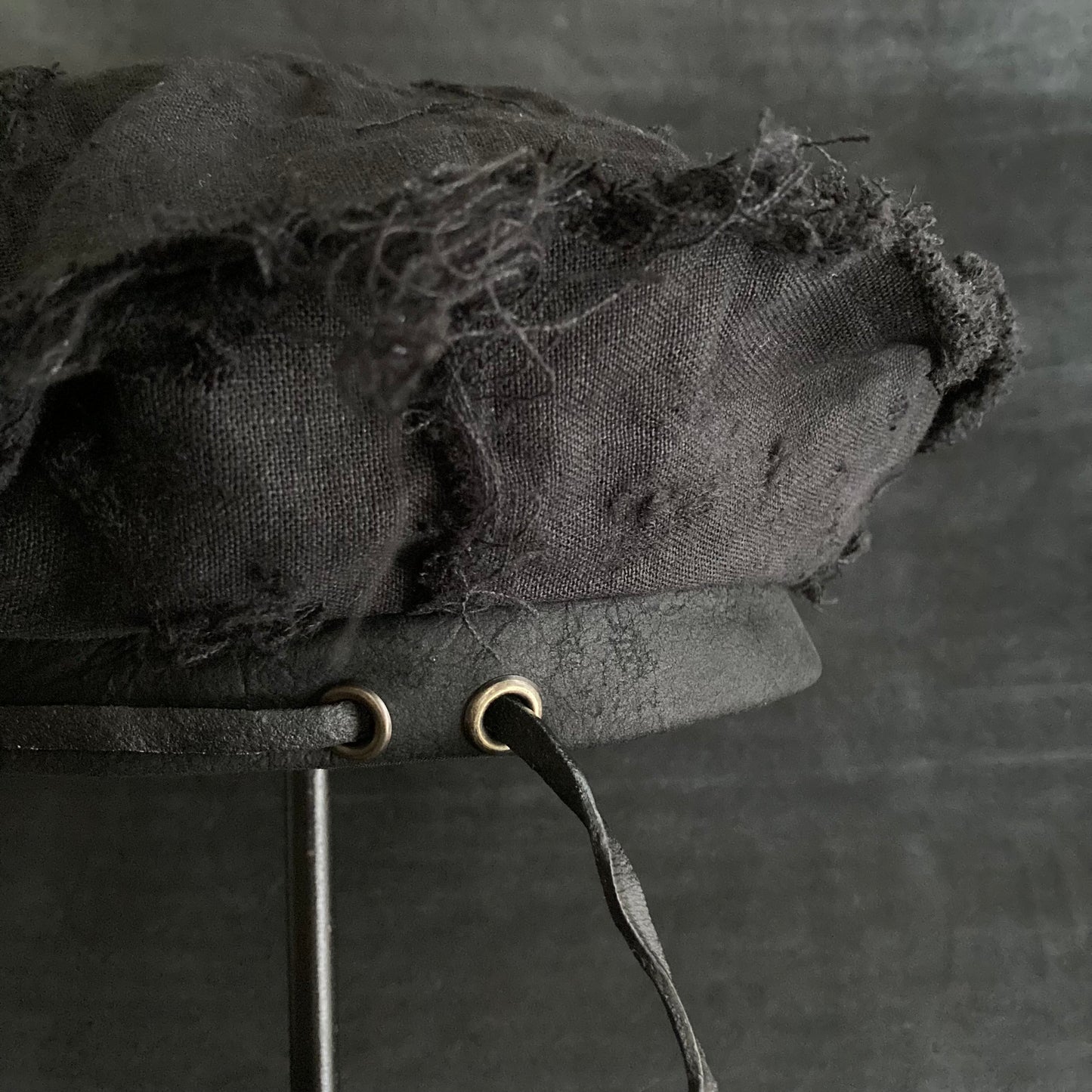 Back side black linen leather strap beret