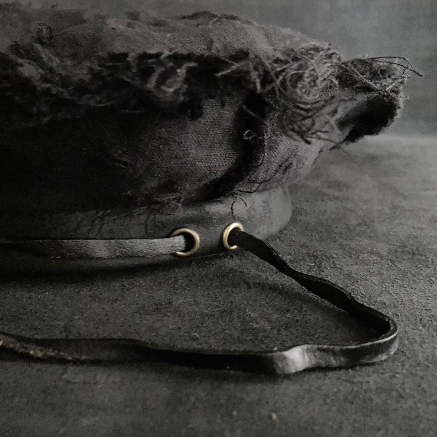 Back side black linen leather strap beret