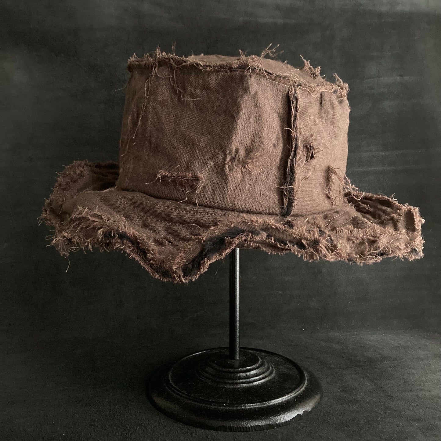 Back side brown linen damage bucket hat