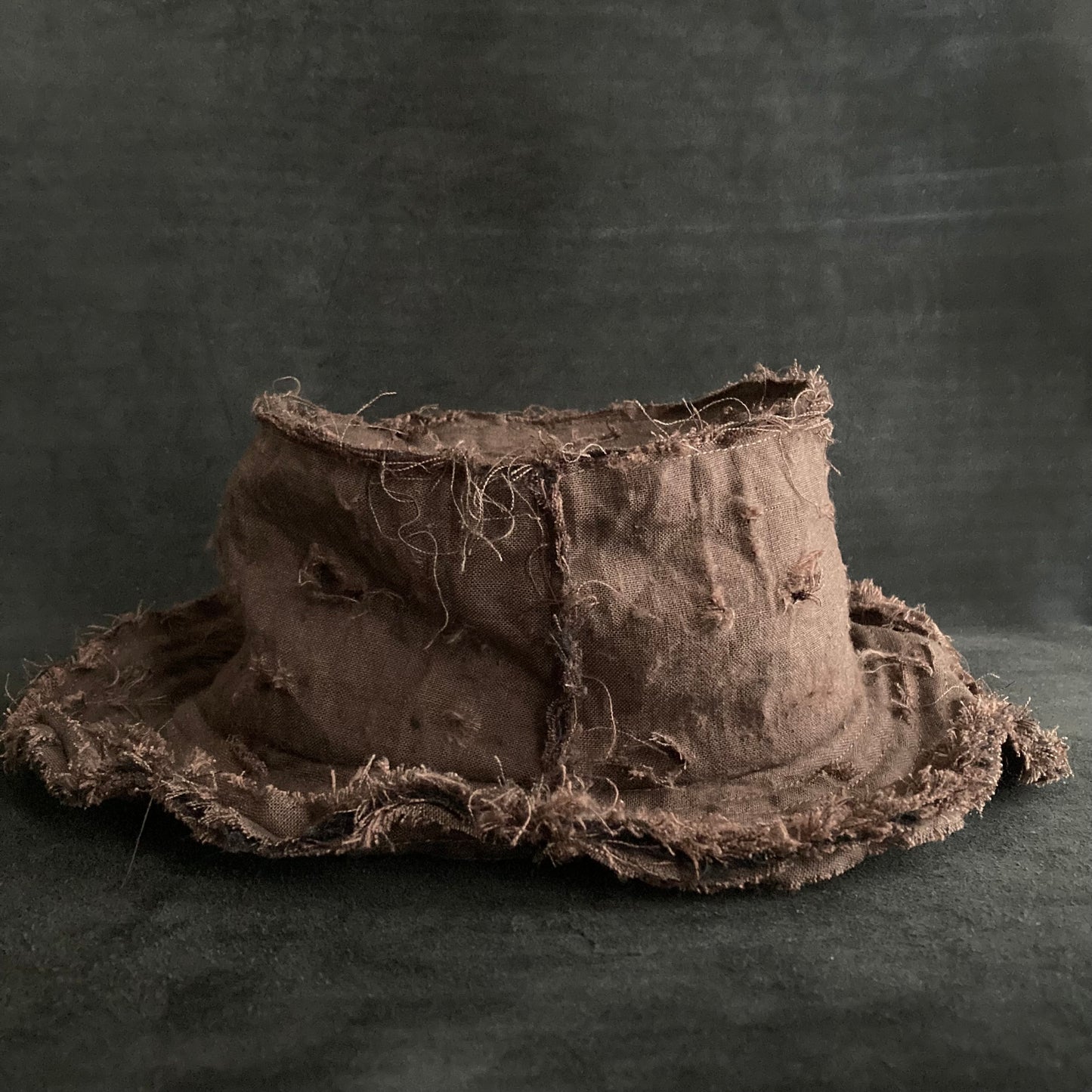 Back side brown linen damage bucket hat