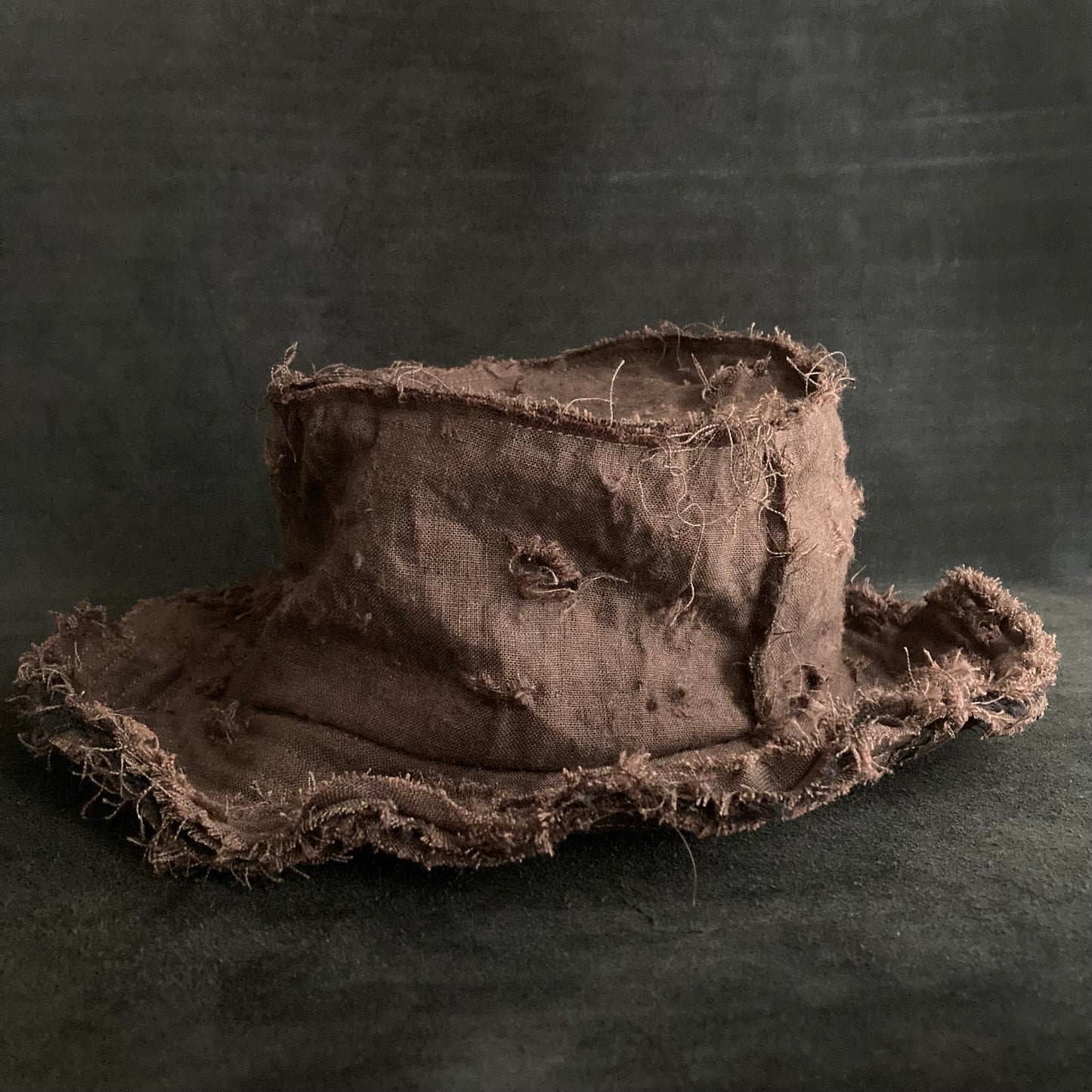 Back side brown linen damage bucket hat