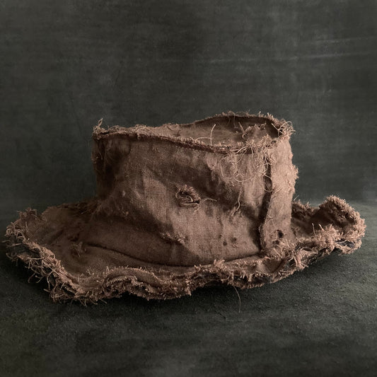 Back side brown linen damage bucket hat