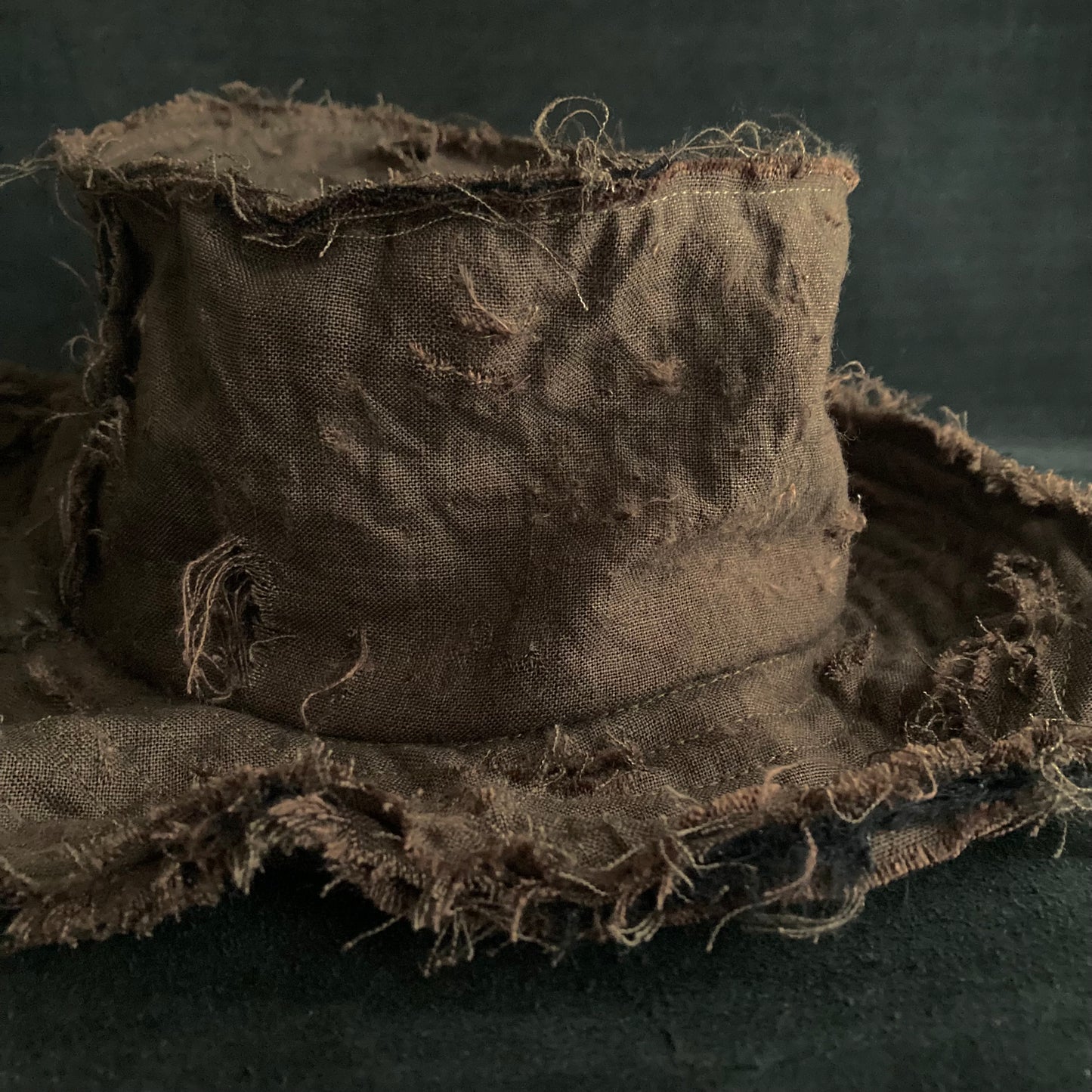 Back side brown linen damage bucket hat