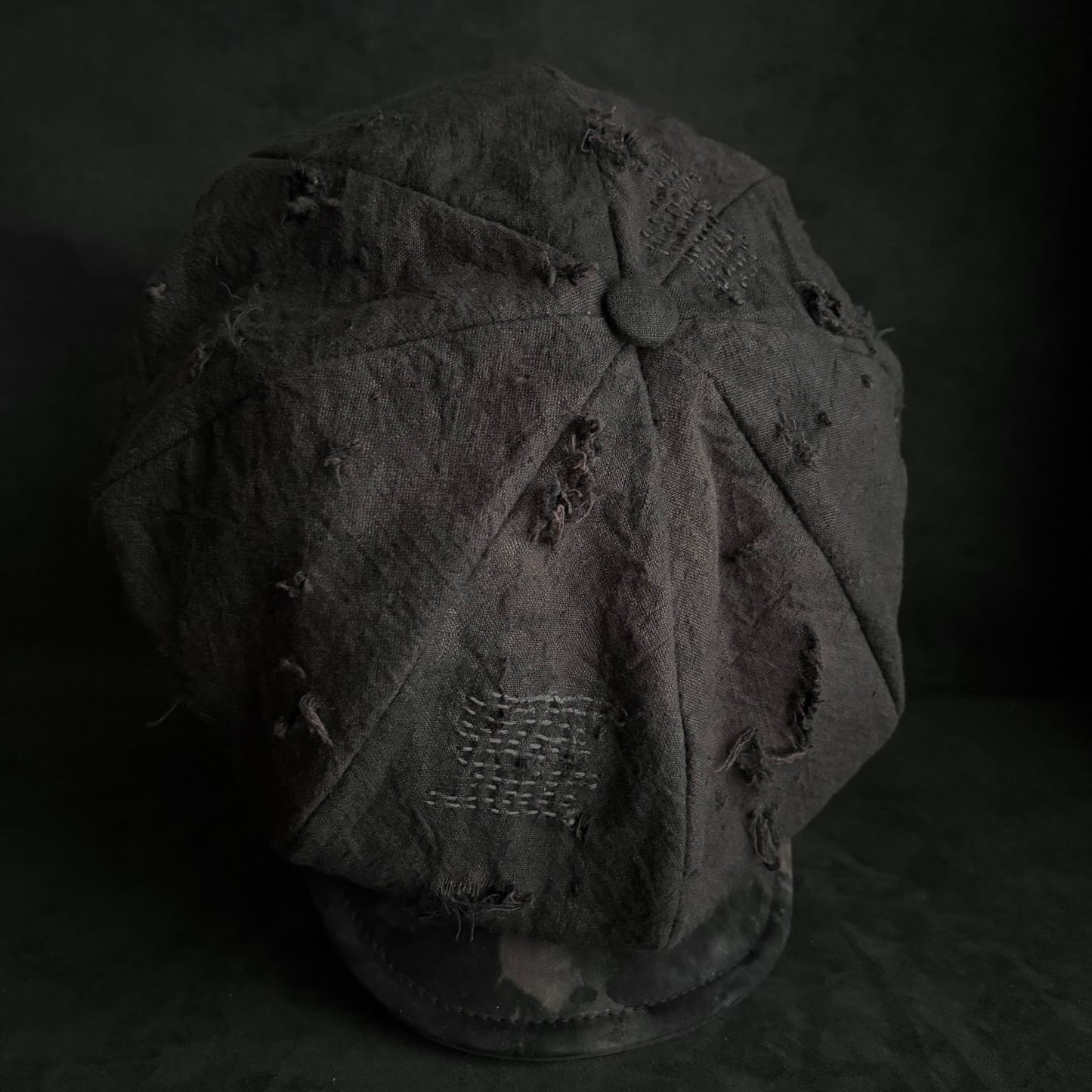 Large volume brown/black dyed waxed stitch damage casquette