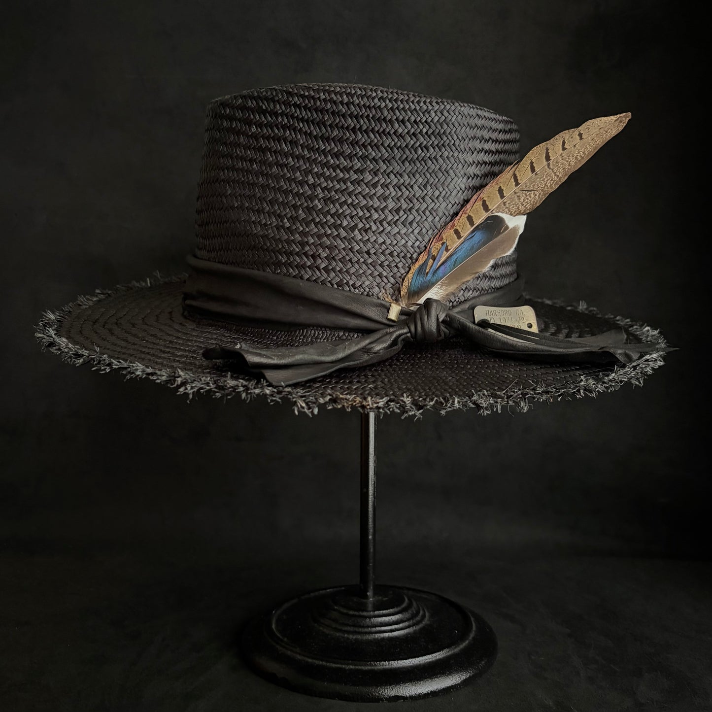 Stray black fedora panama hat