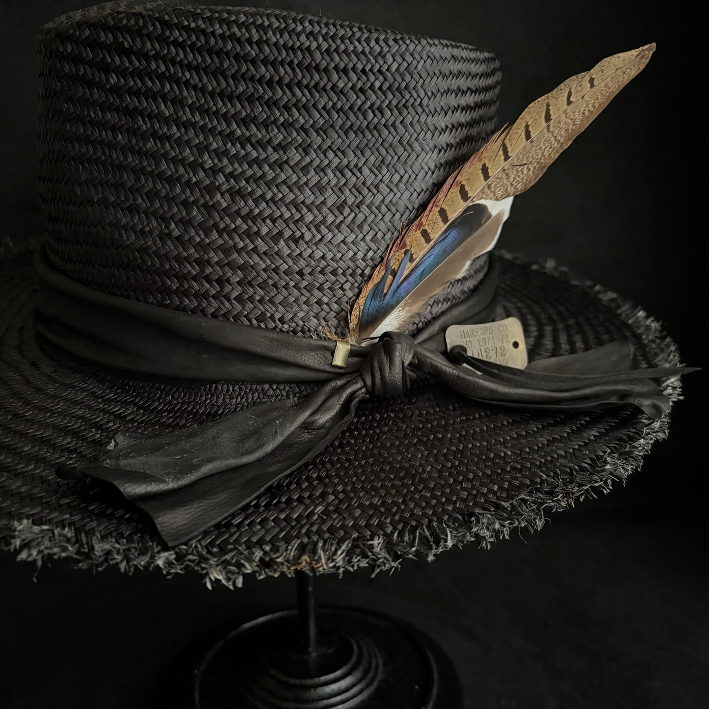 Stray black fedora panama hat