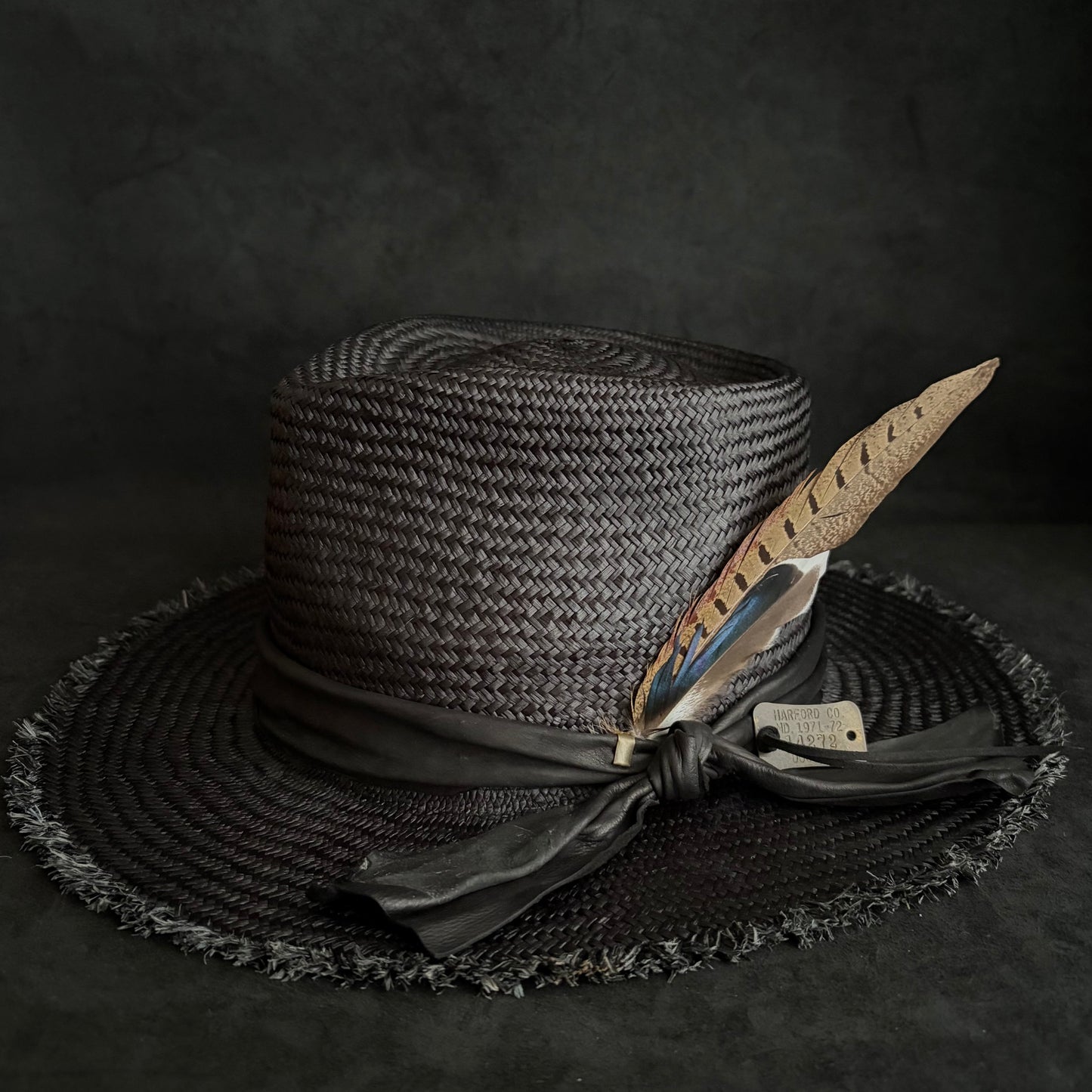 Stray black fedora panama hat