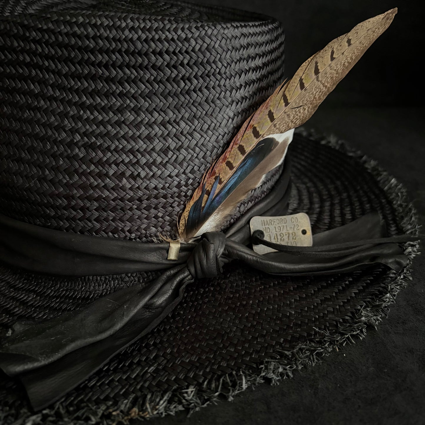 Stray black fedora panama hat