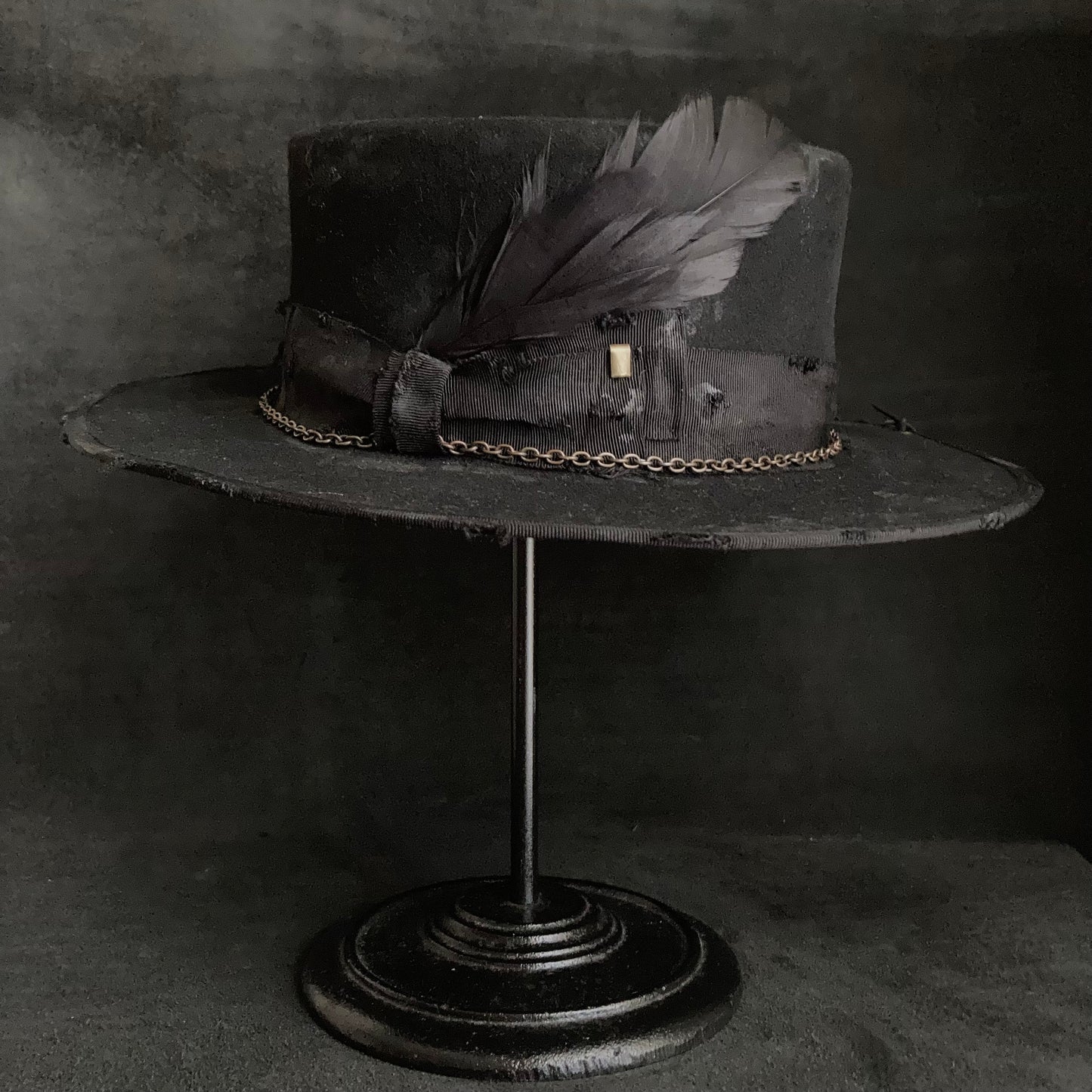 Dirt black old flat hat