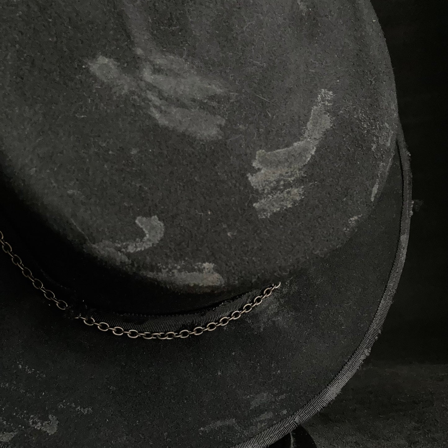 Dirt black old flat hat