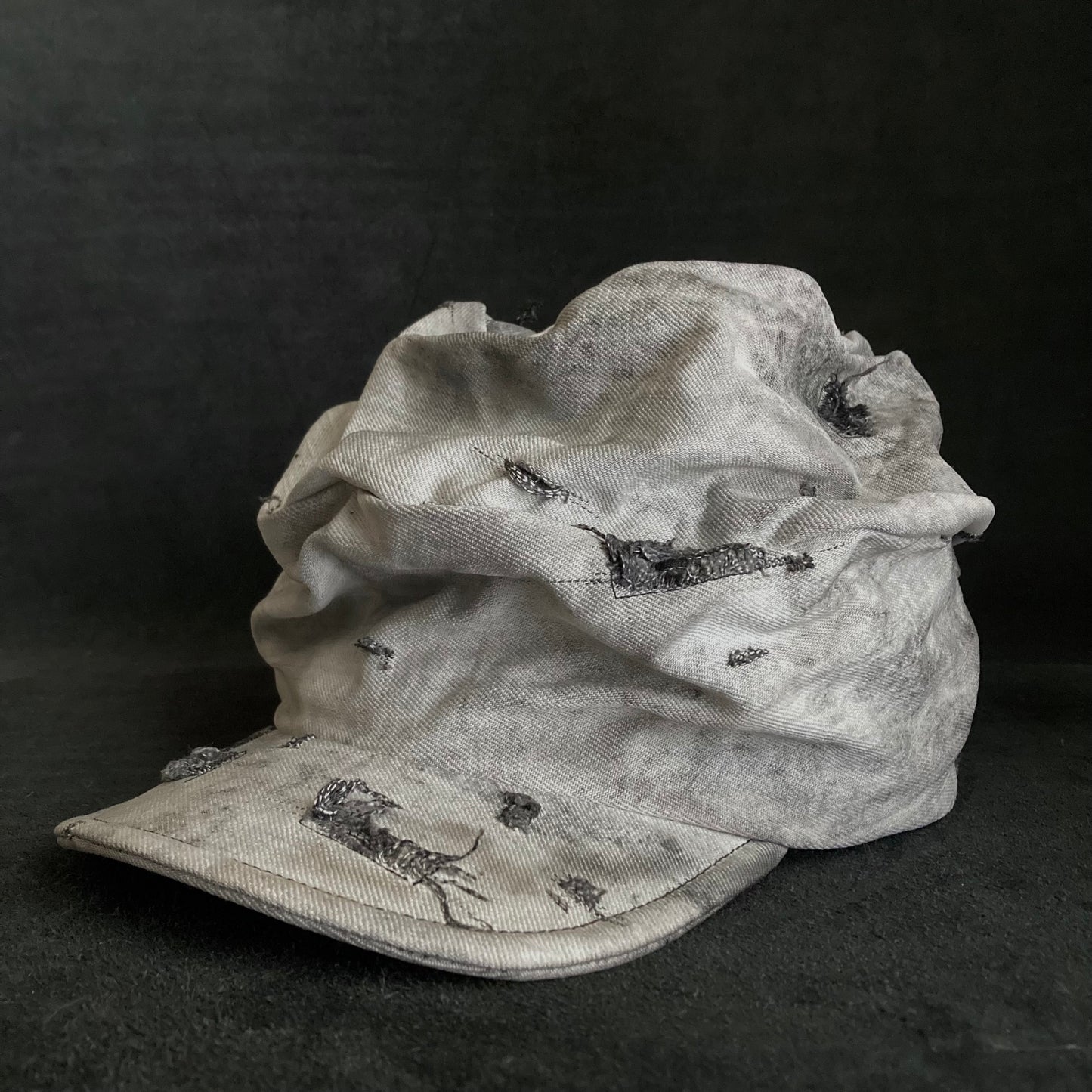 Hard bleached white/black denim turn cap