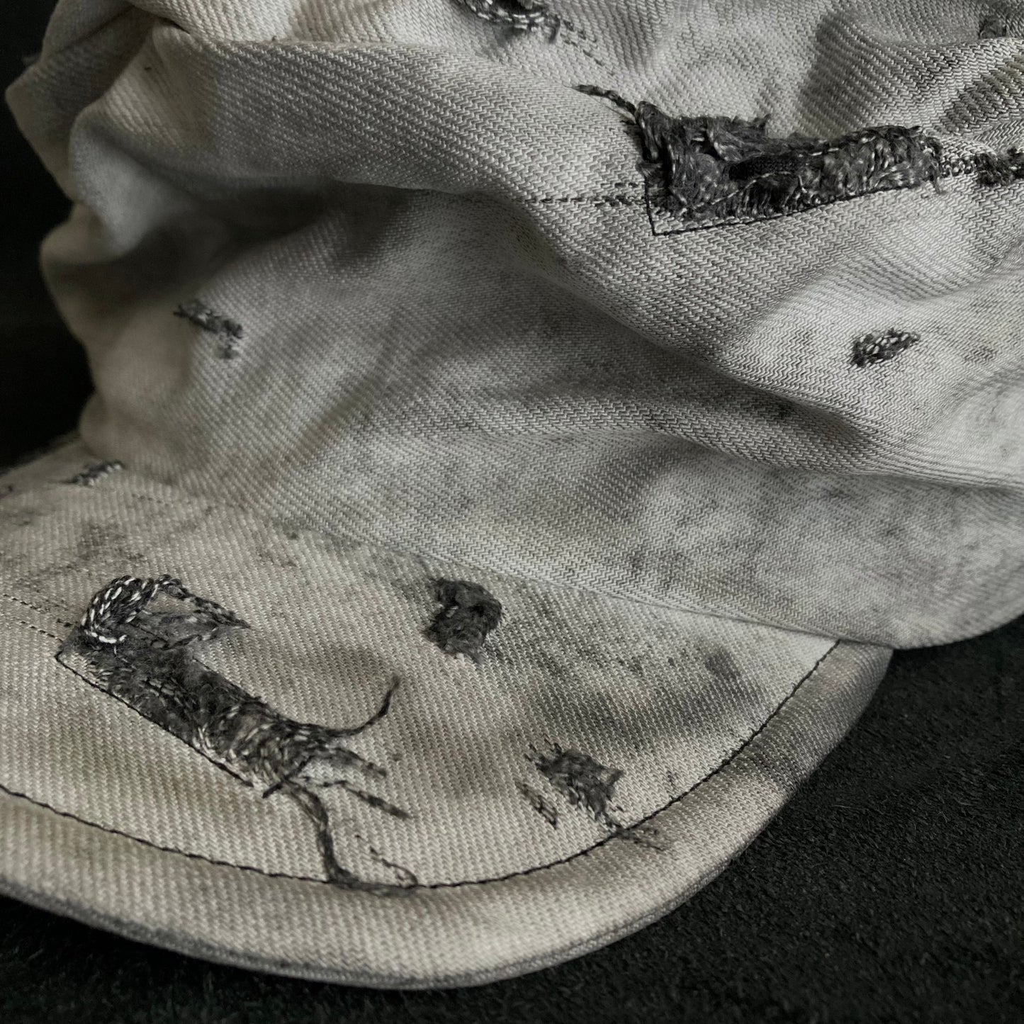 Hard bleached white/black denim turn cap