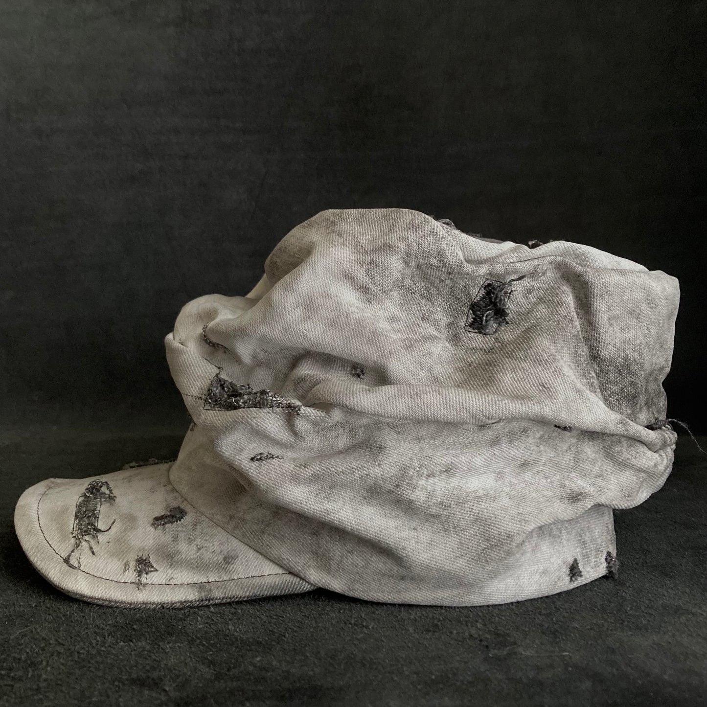 Hard bleached white/black denim turn cap