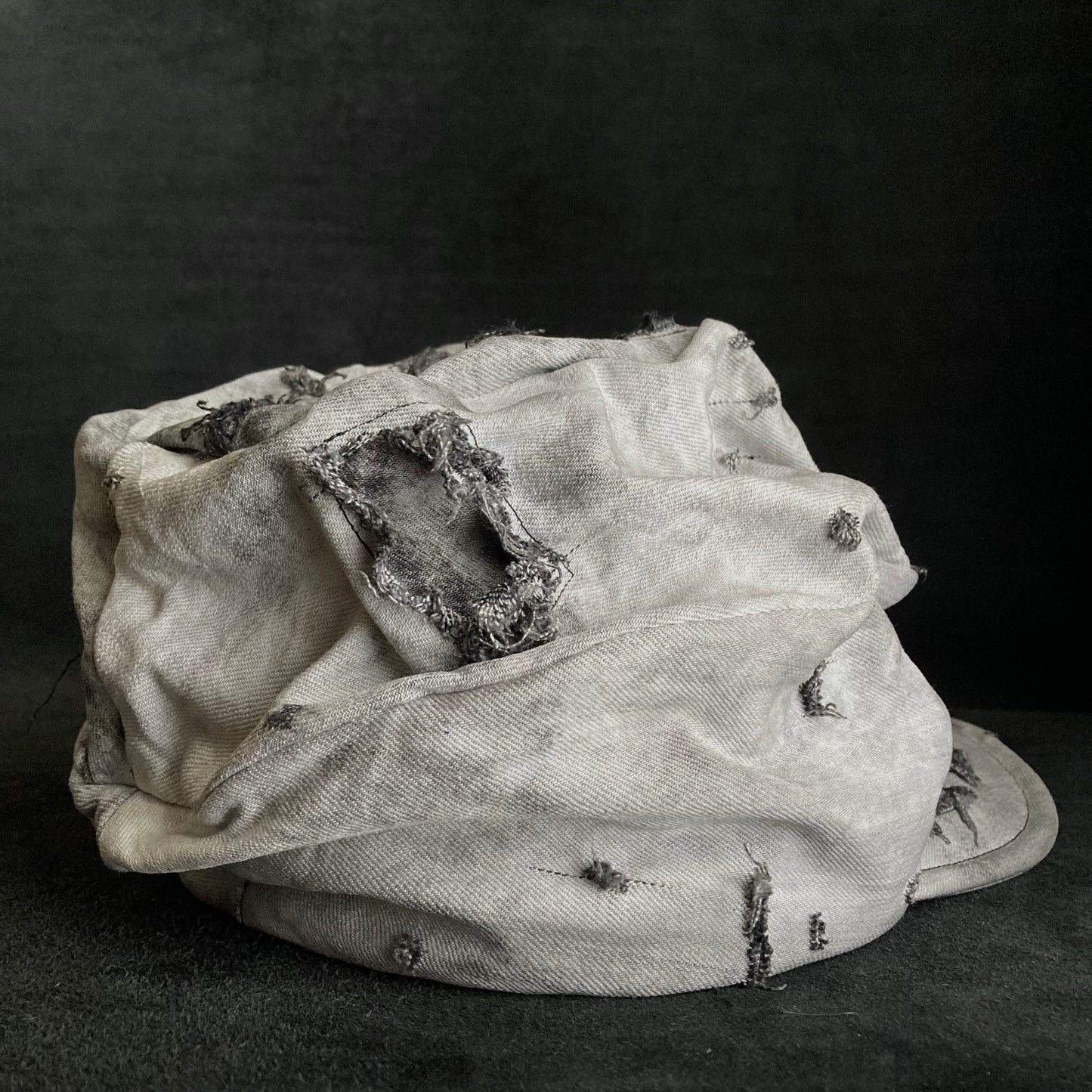 Hard bleached white/black denim turn cap