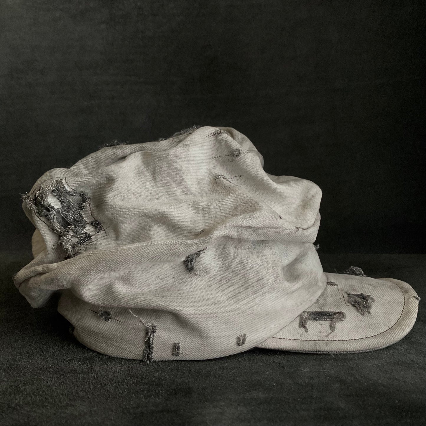 Hard bleached white/black denim turn cap