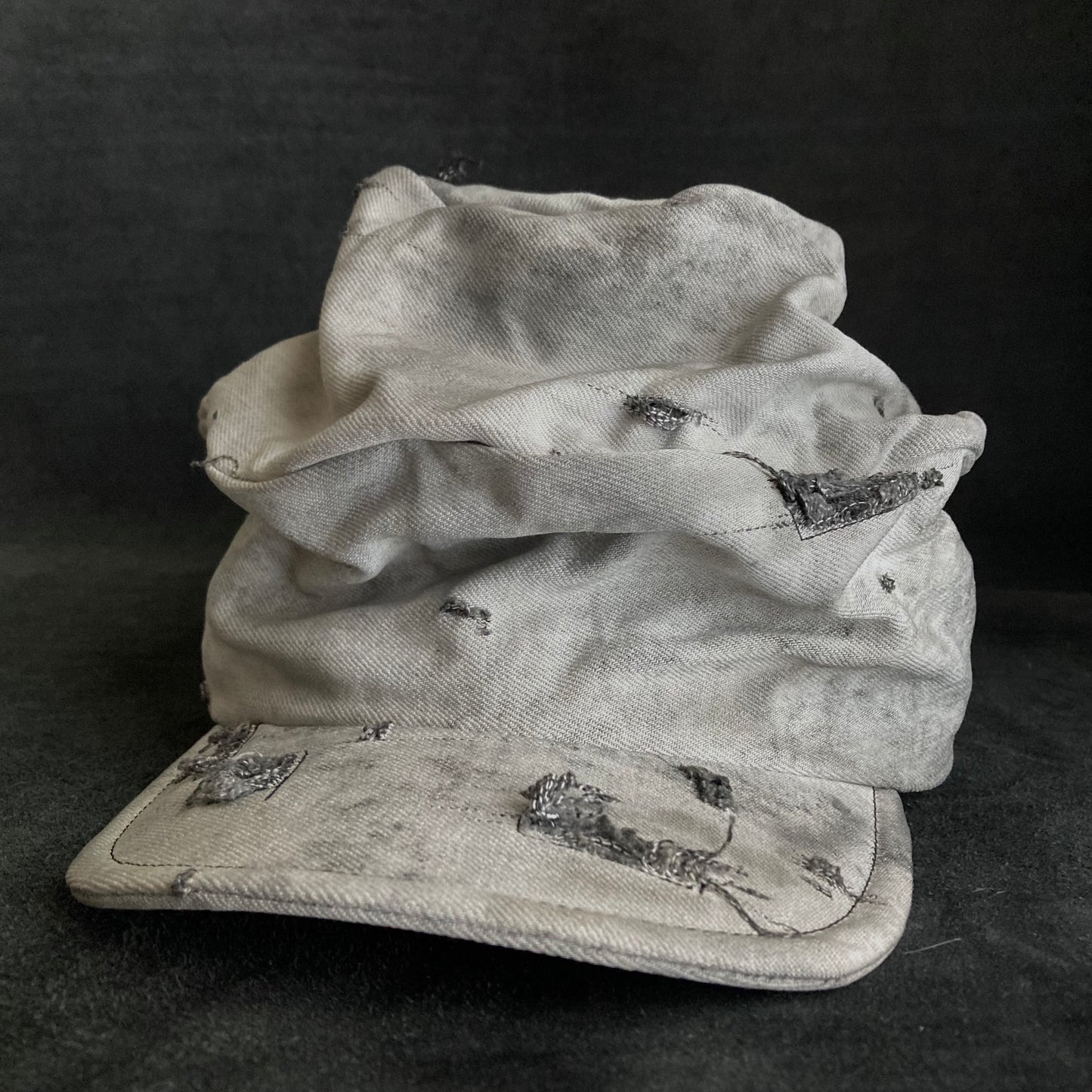 Hard bleached white/black denim turn cap