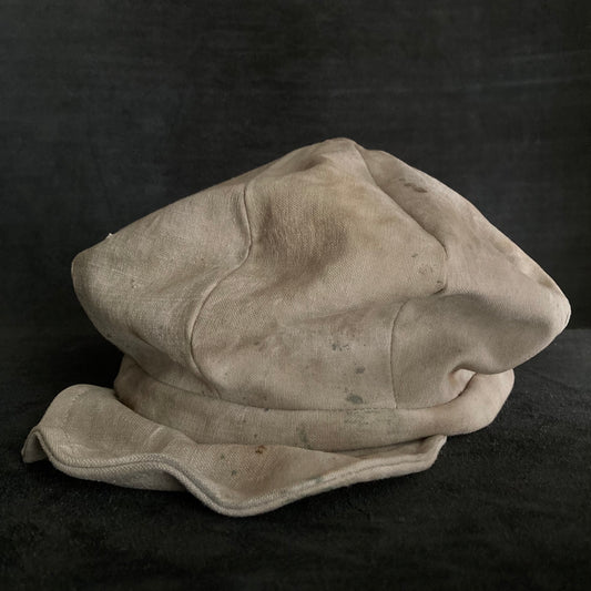 Old beige cloth casquette