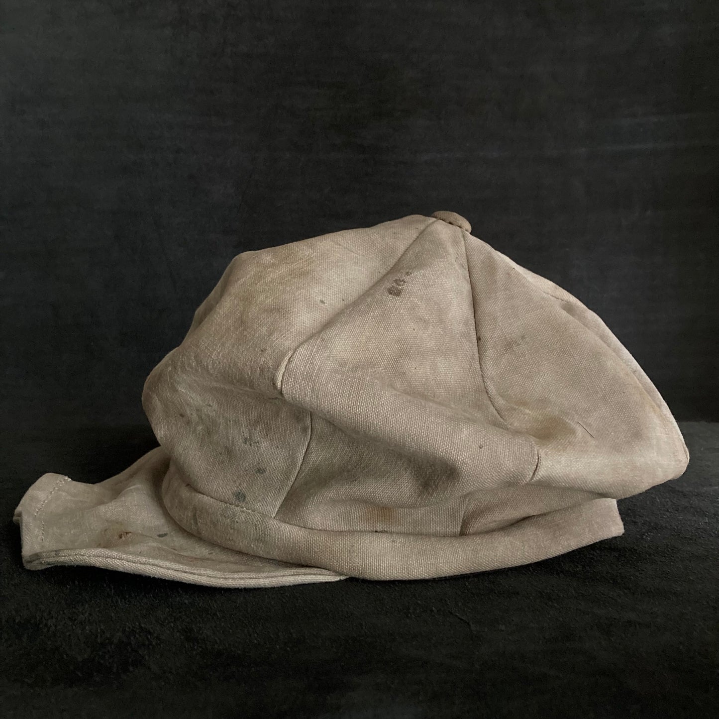 Old beige cloth casquette