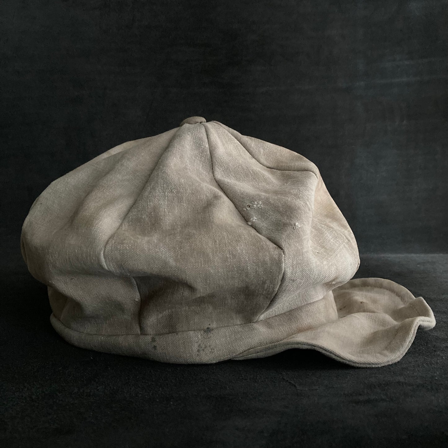 Old beige cloth casquette