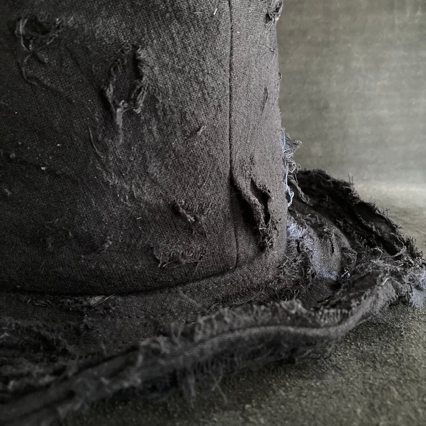 Black linen damage  fedora hat