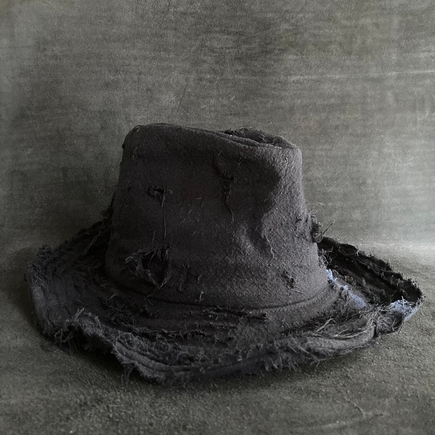 Black linen damage  fedora hat