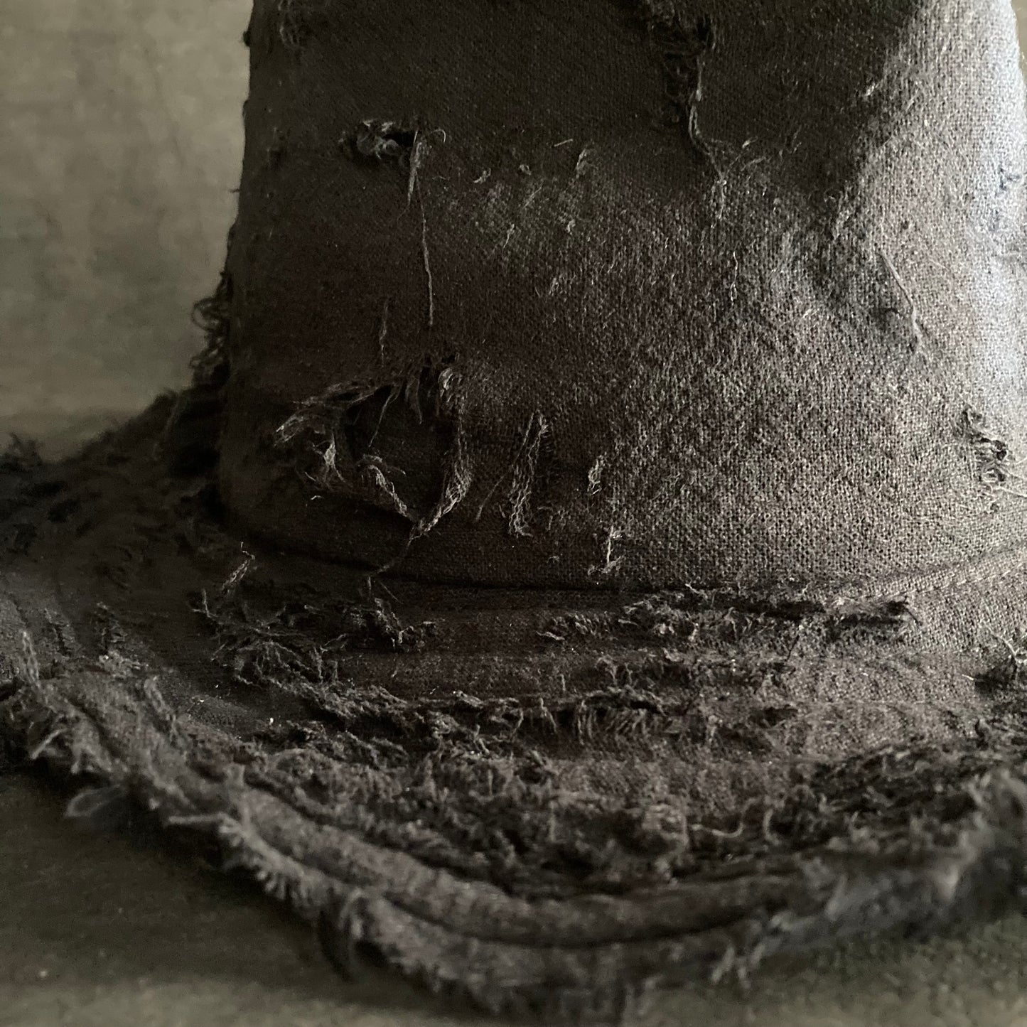 Black linen damage  fedora hat