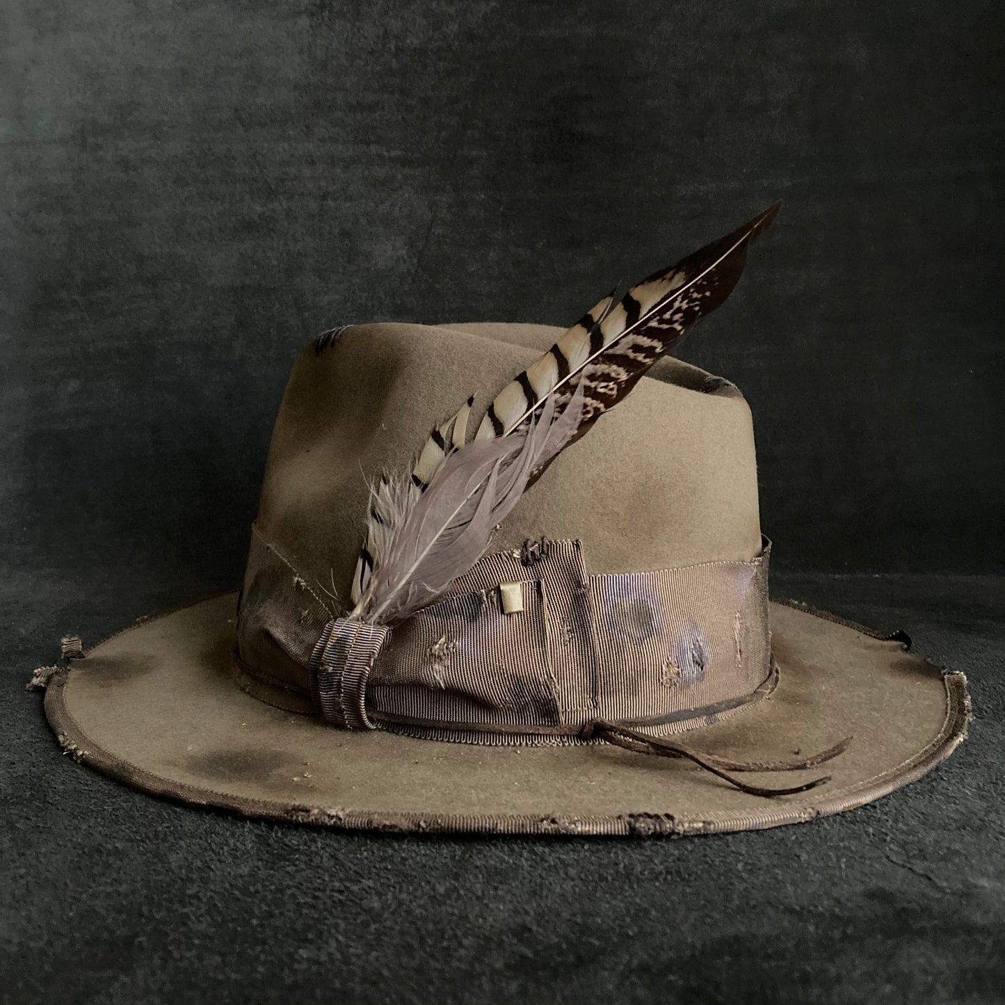 Feel feathers damage fedora hat