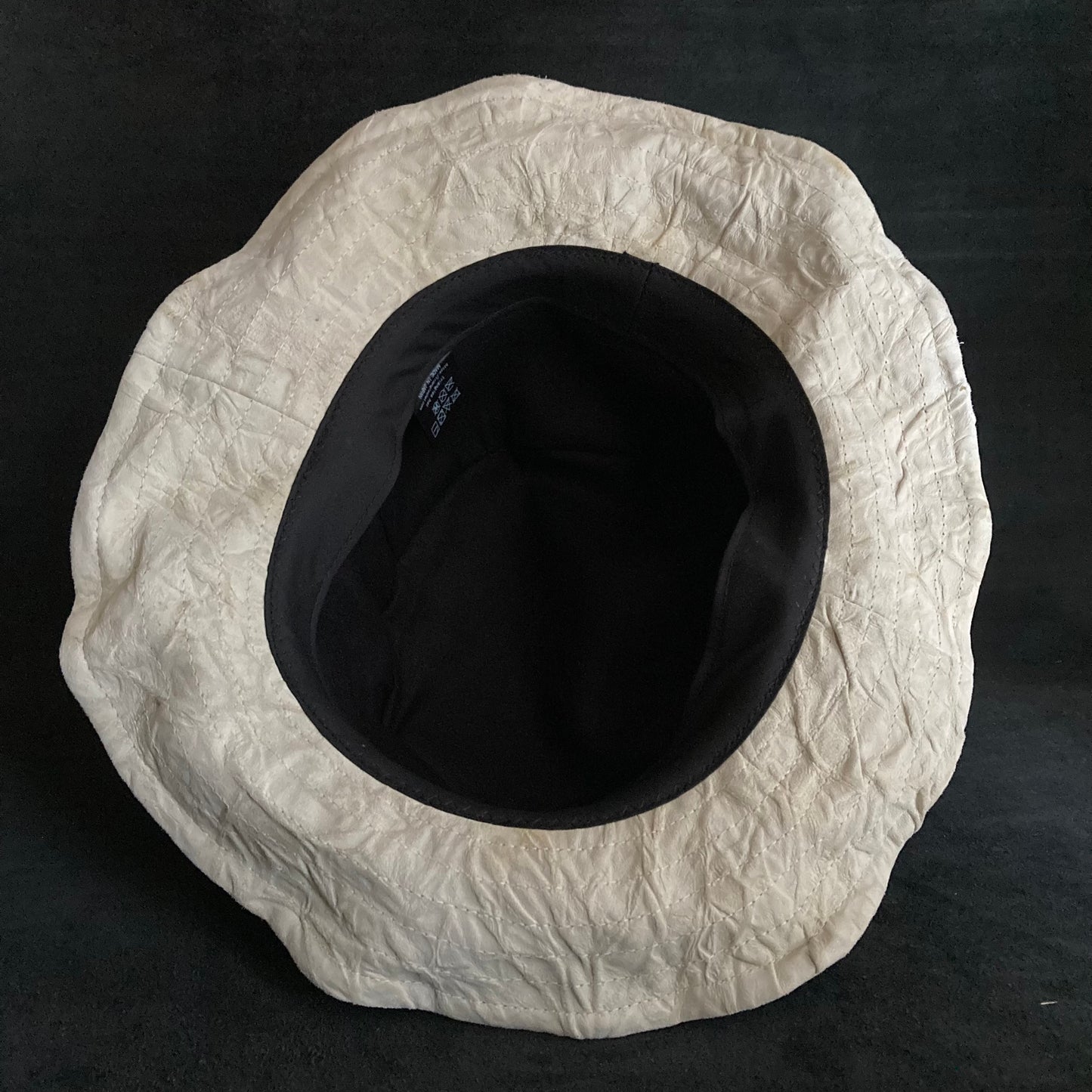 Wrinkled ivory leather bucket hat